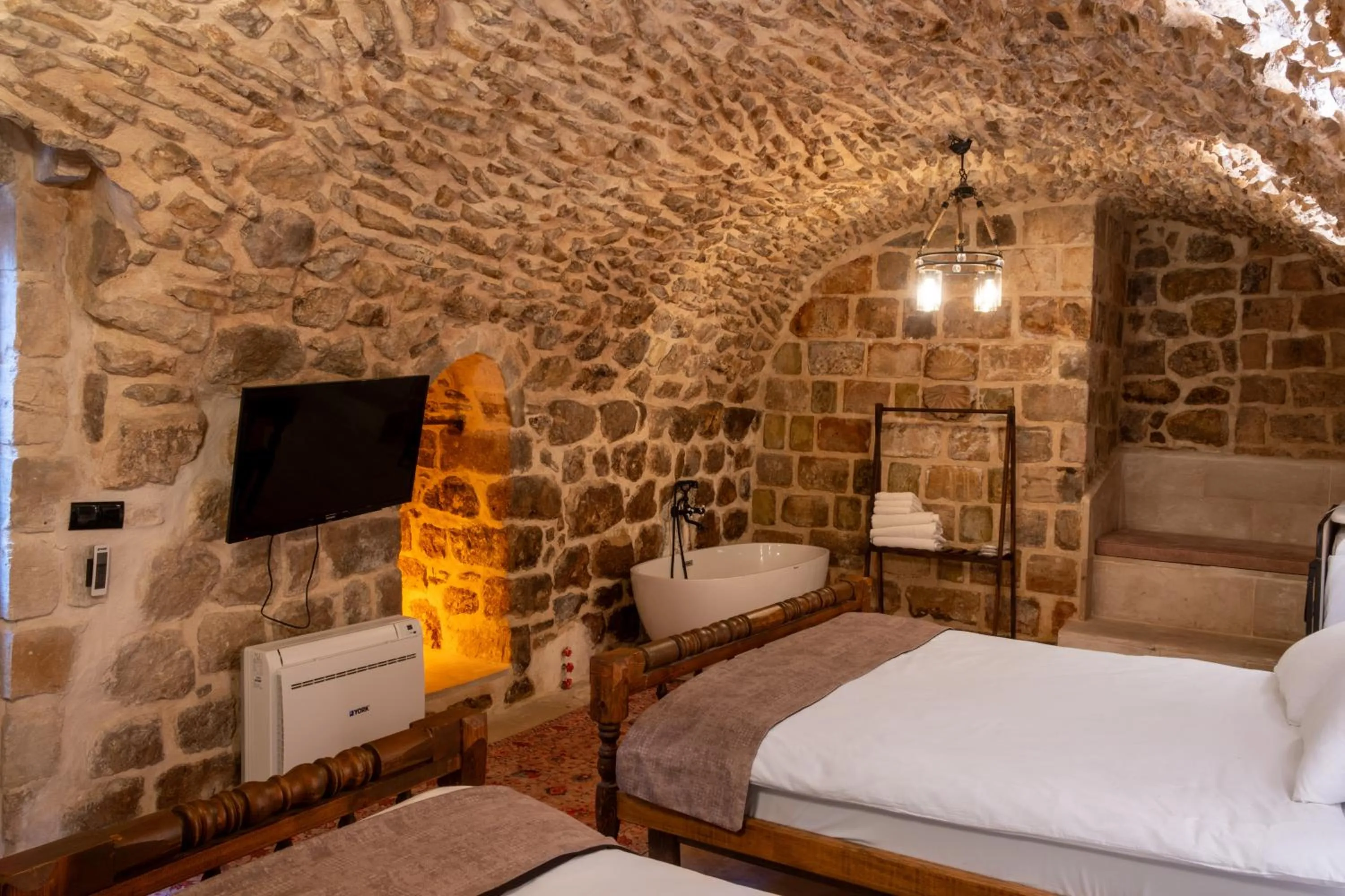 Bed in Marvel Hotel Mardin