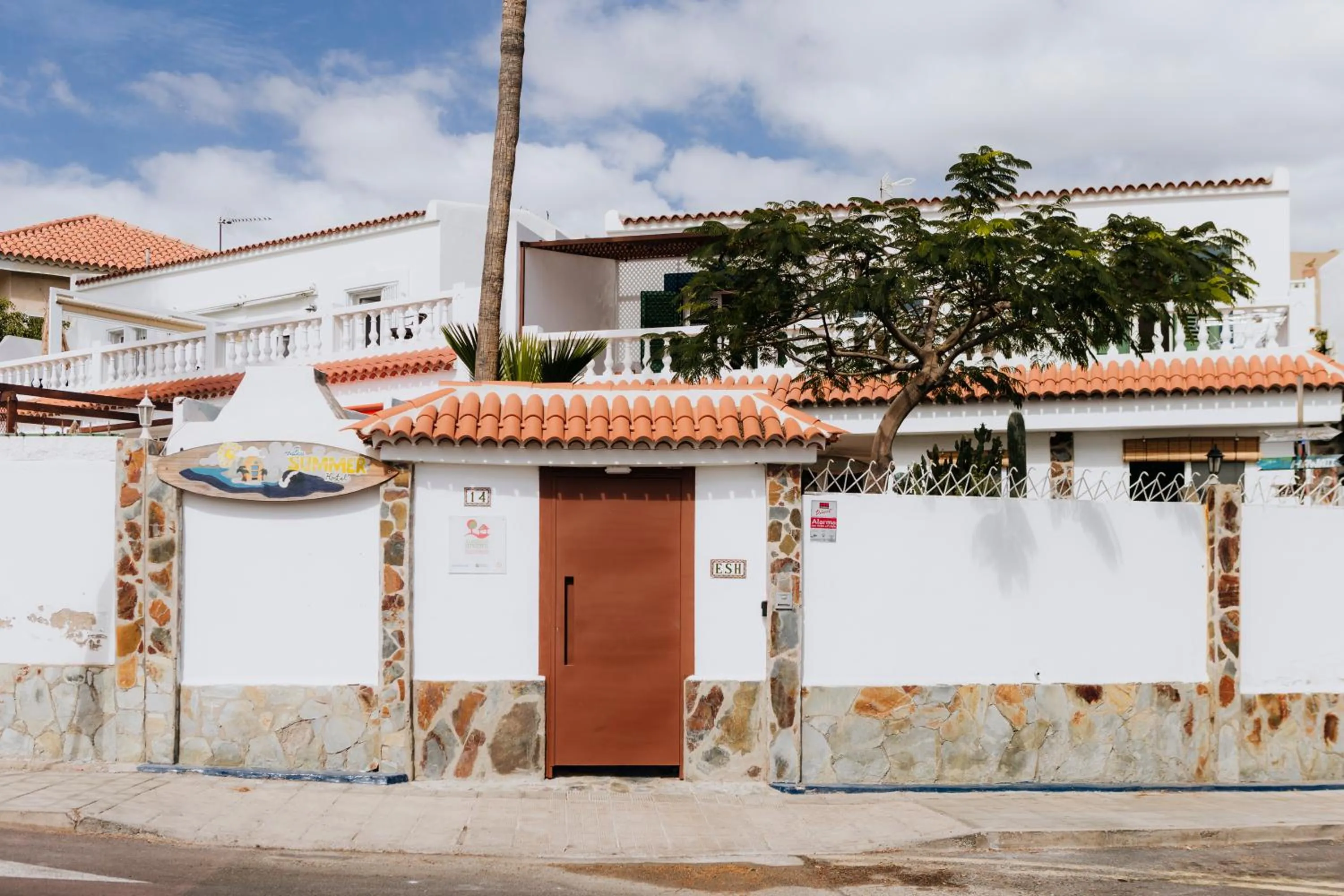 Property building in Endless Summer Hostel