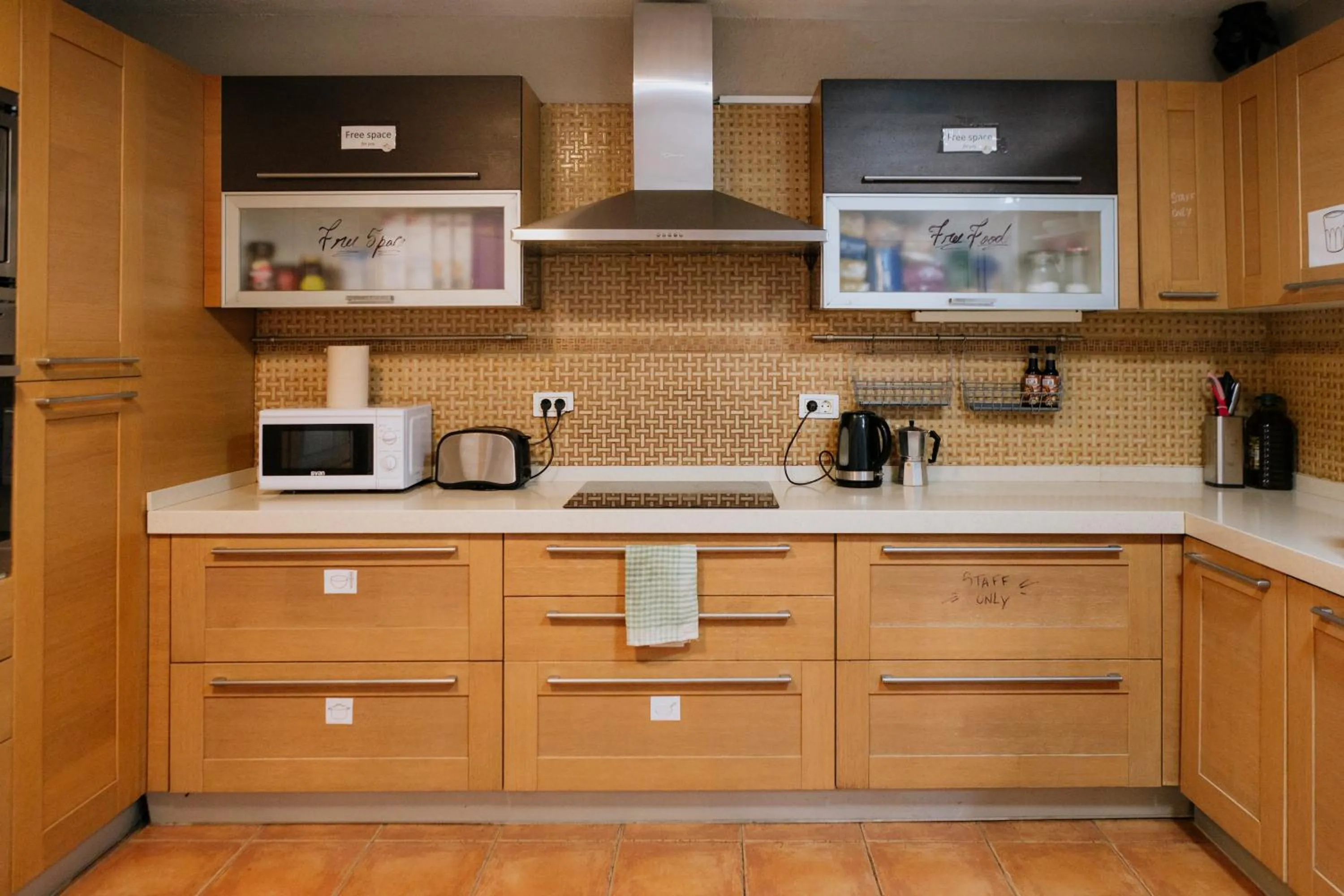 Communal kitchen in Endless Summer Hostel