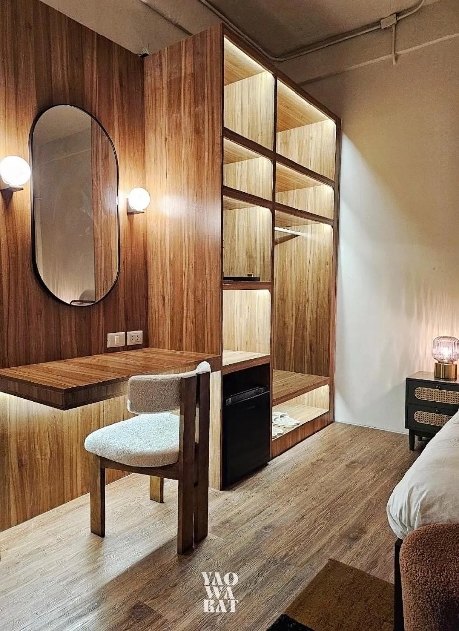 Living room, Bed in Yaowarat Stay