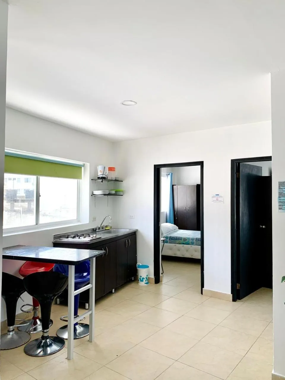 Kitchen or kitchenette, Bed in Caribbean Island Hotel