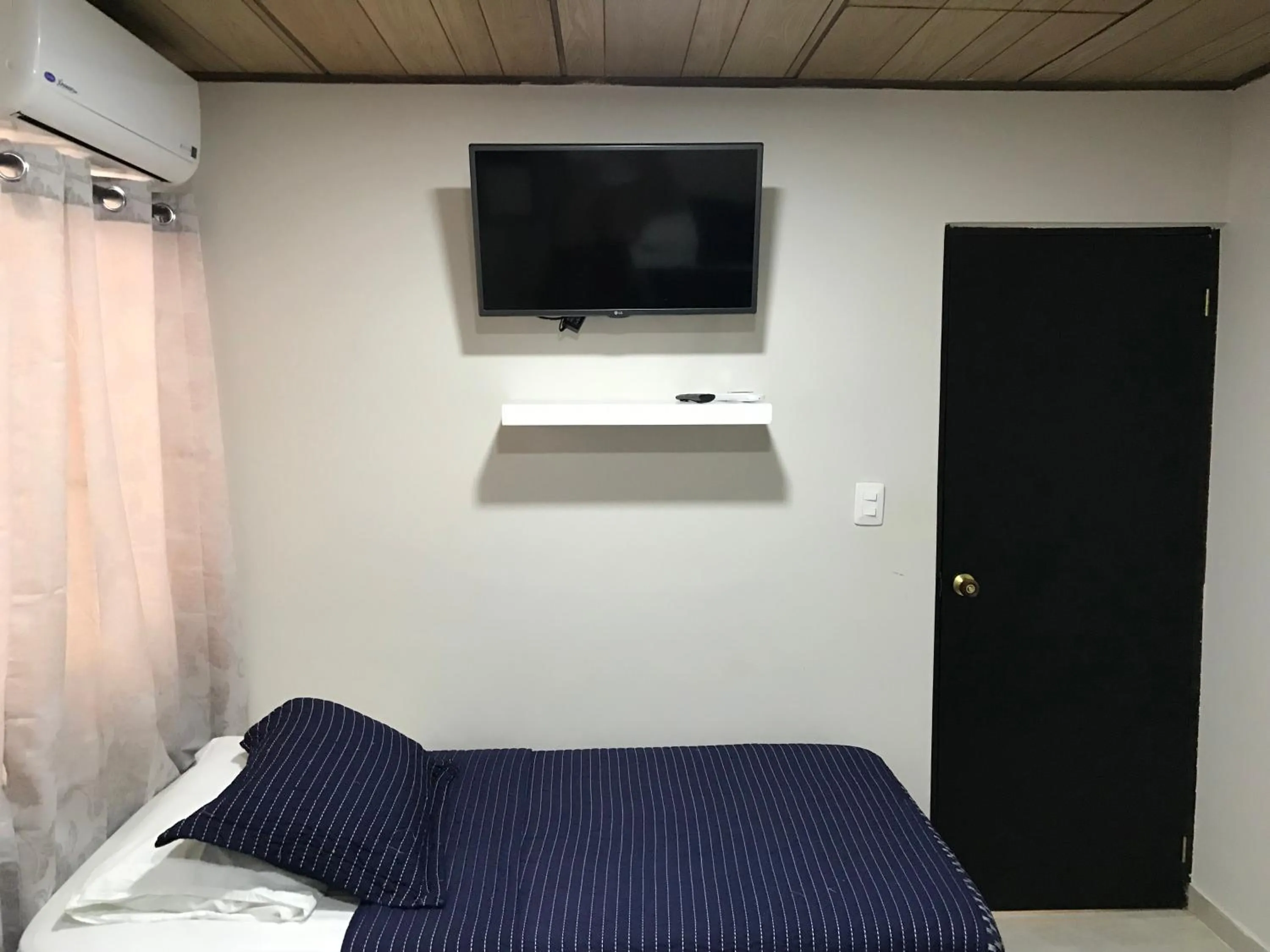 Bed in Caribbean Island Hotel