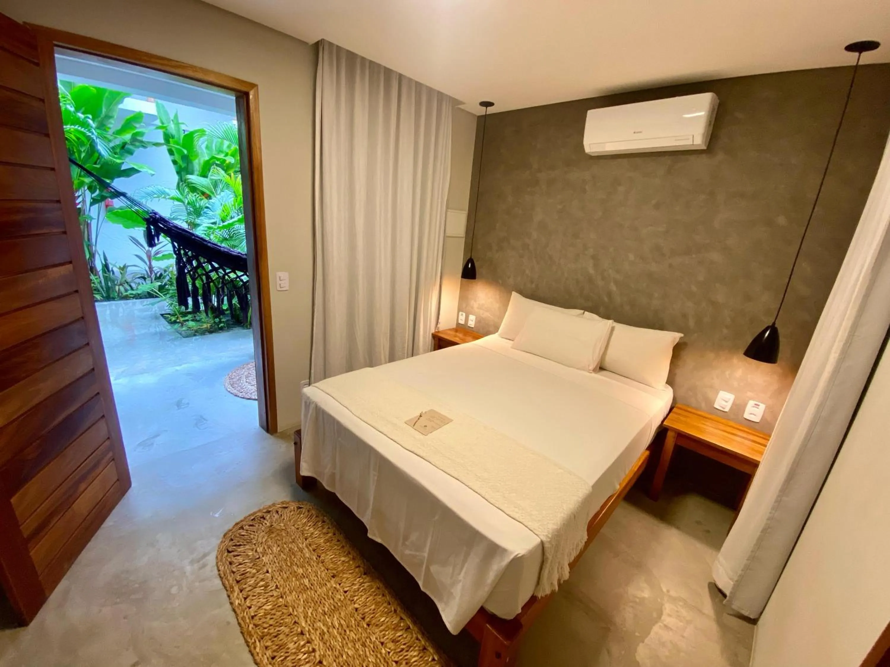 Bed in Pousada Baobá