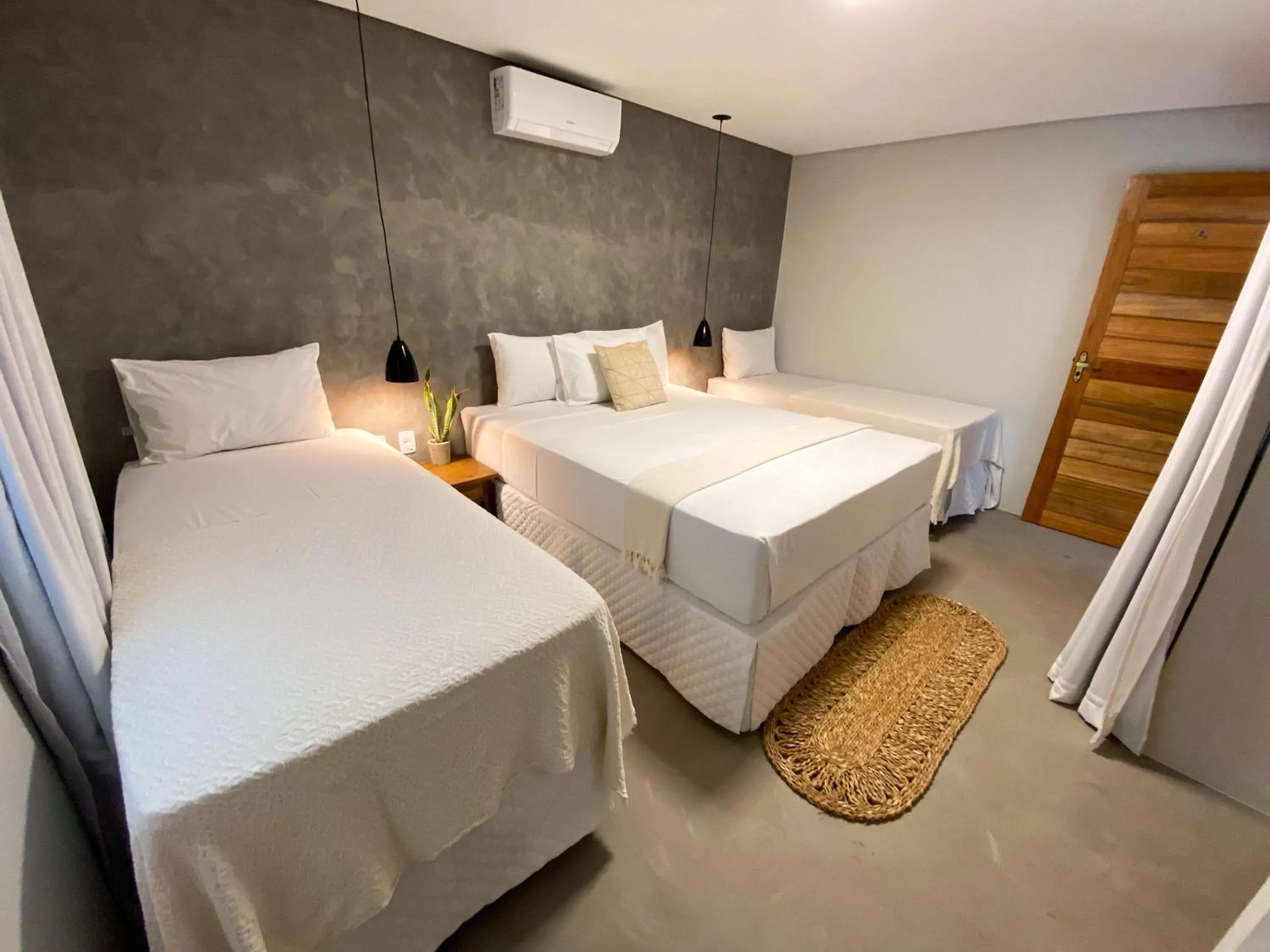 Bed in Pousada Baobá