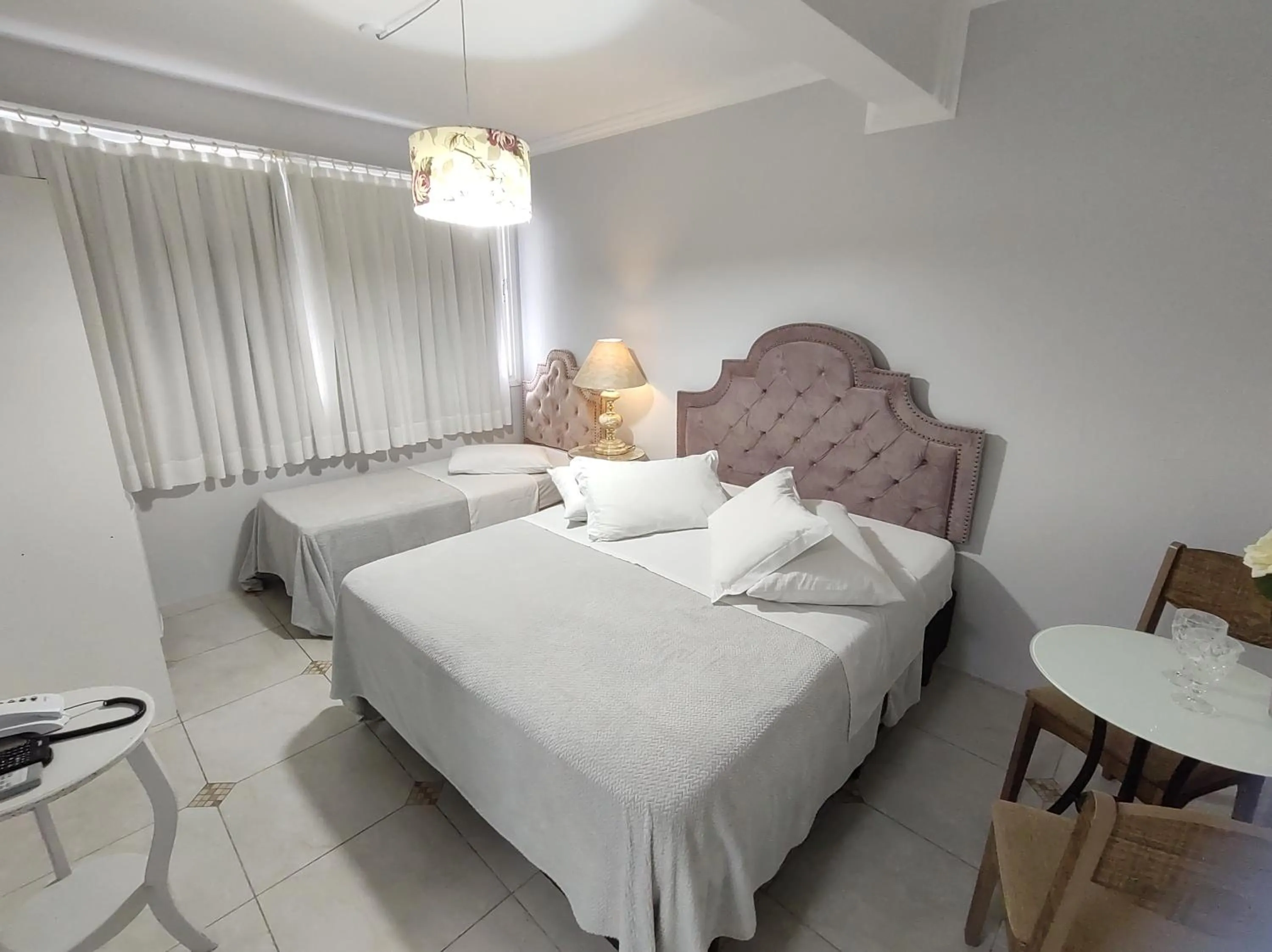 Bed in Hotel Imigrantes