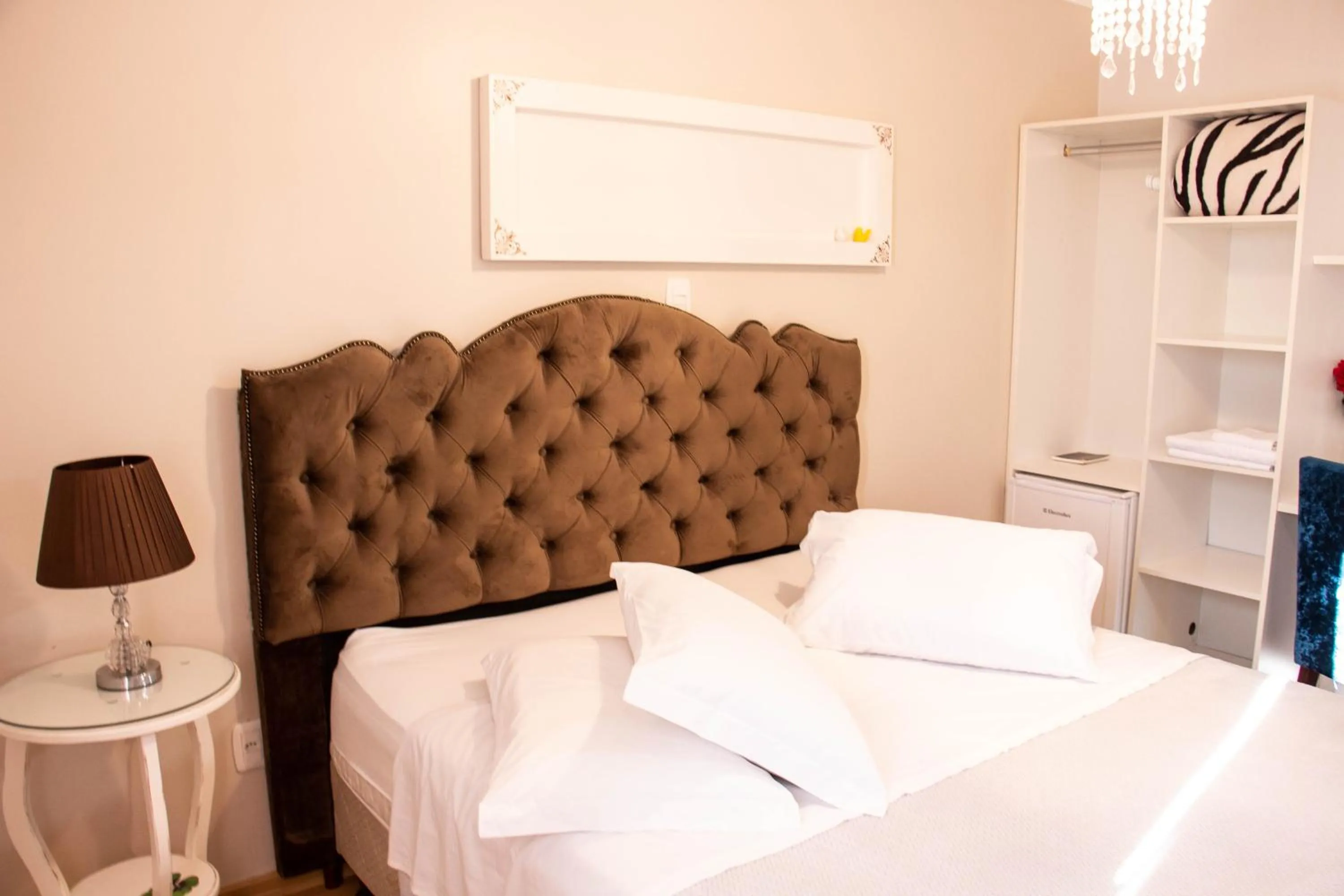 Bed in Hotel Imigrantes