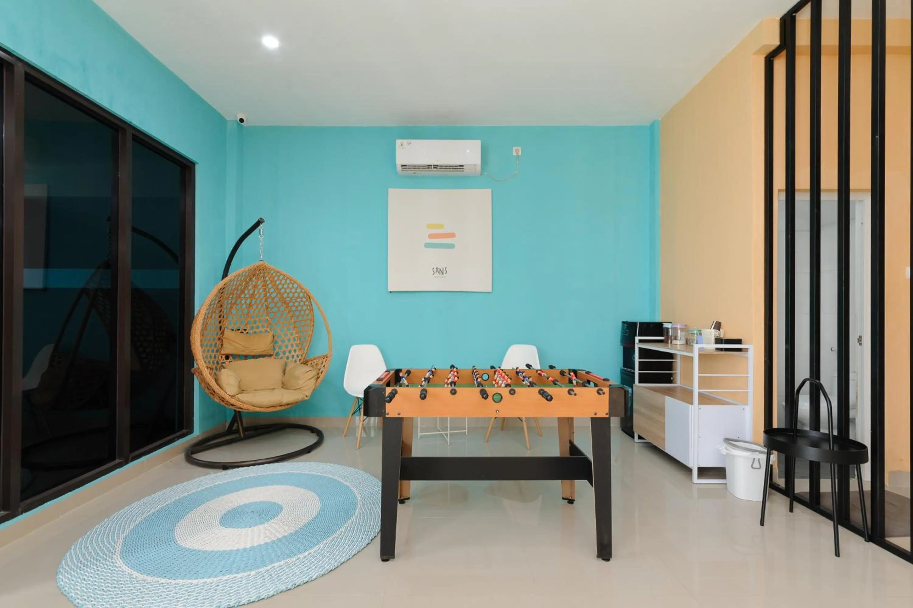 Seating area in Sans Hotel Cibanteng Dramaga Bogor