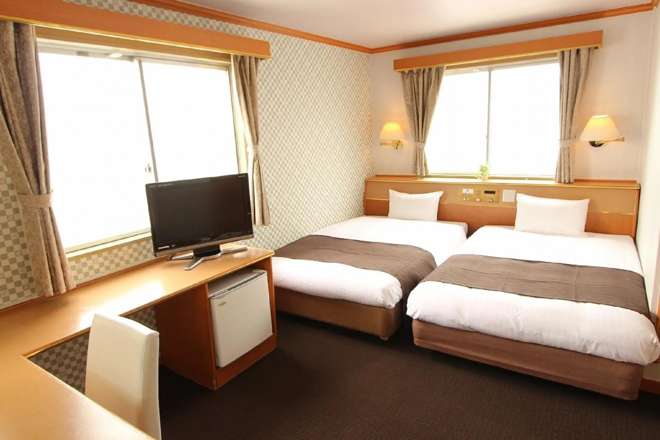 Bedroom in HOTEL LiVEMAX BUDGET Okinawa Tomariko