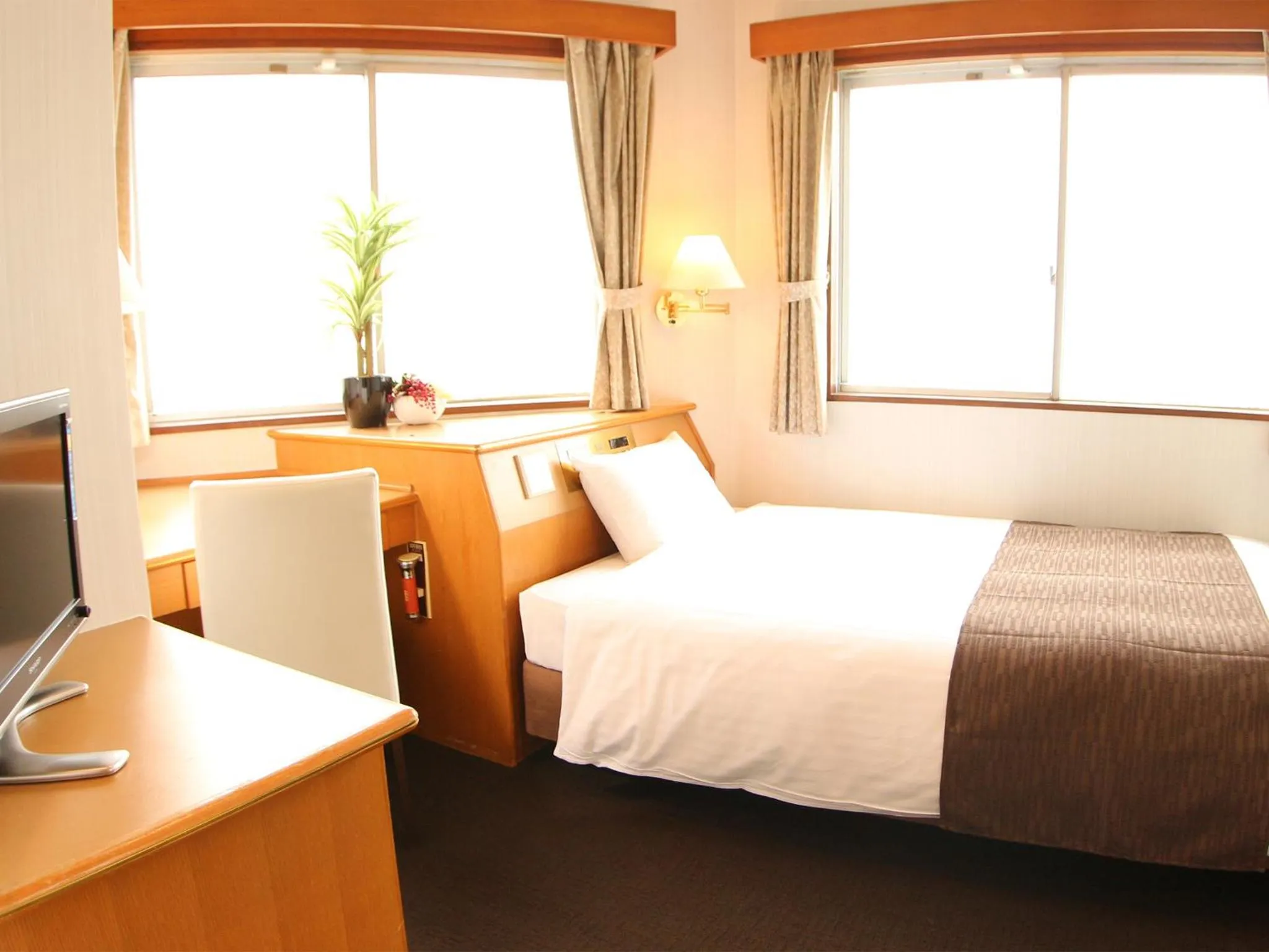 Photo of the whole room in HOTEL LiVEMAX BUDGET Okinawa Tomariko
