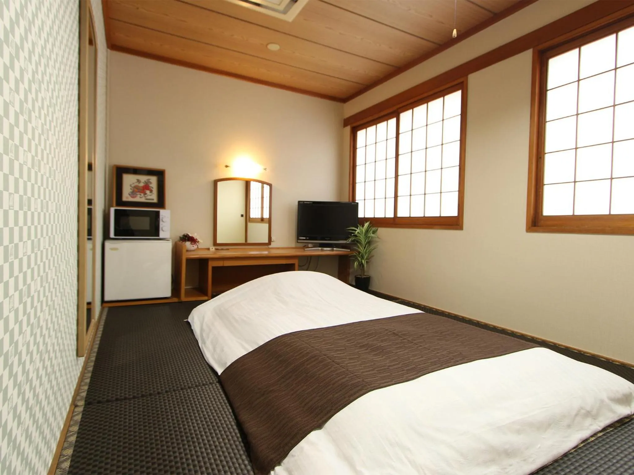 Photo of the whole room in HOTEL LiVEMAX BUDGET Okinawa Tomariko