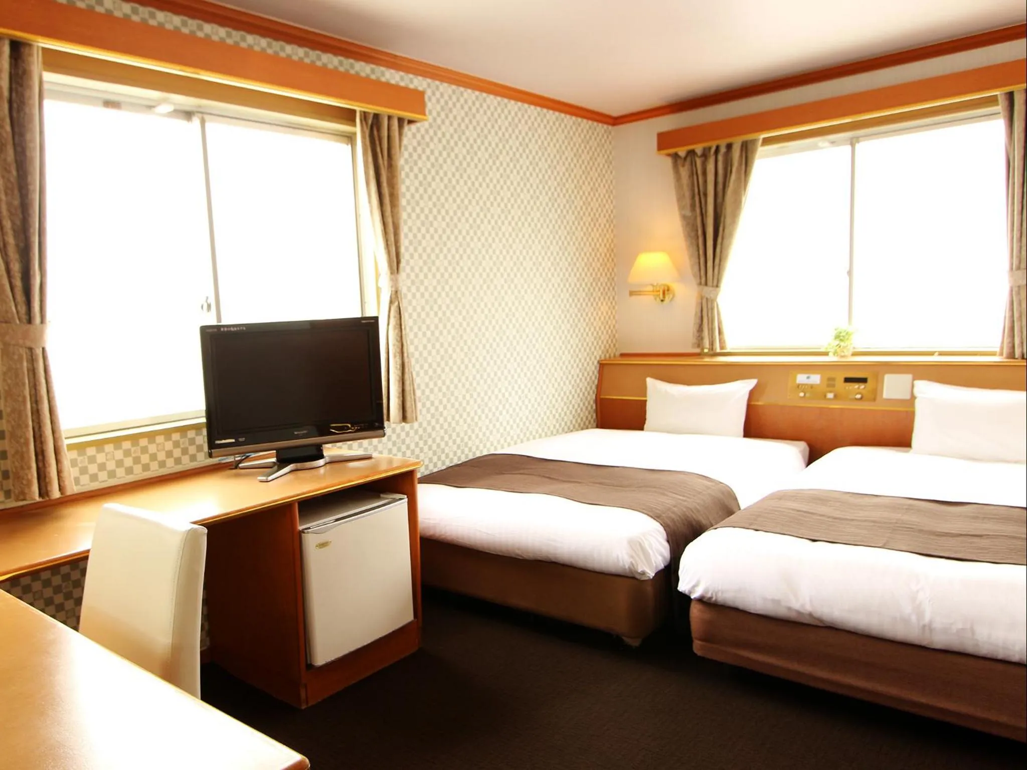 Photo of the whole room in HOTEL LiVEMAX BUDGET Okinawa Tomariko