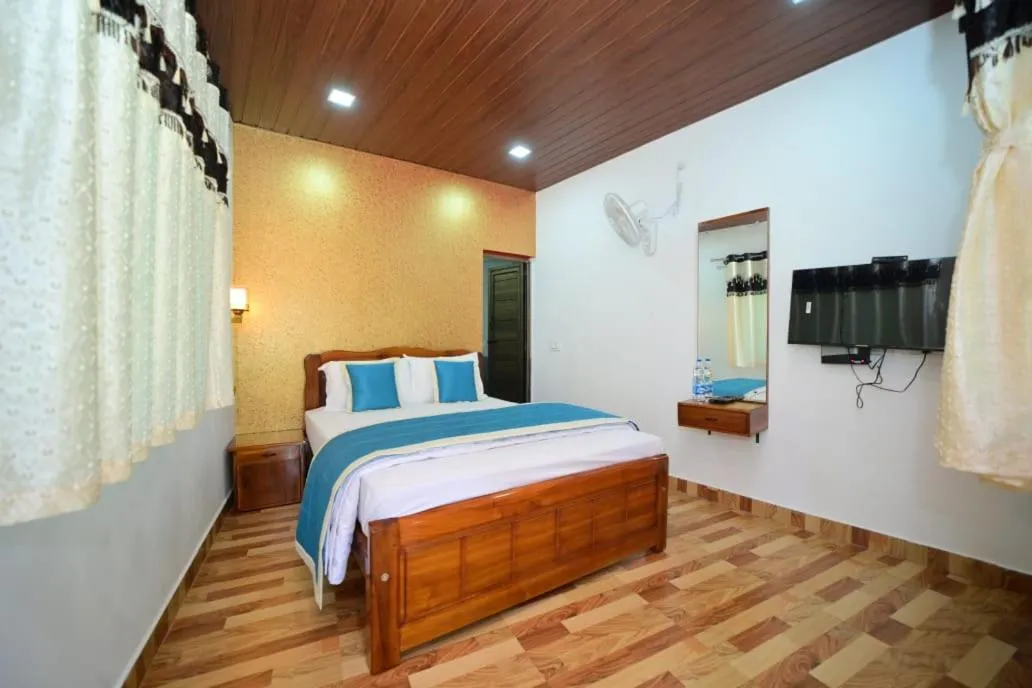 Bed in SIPAYI RESORT COORG