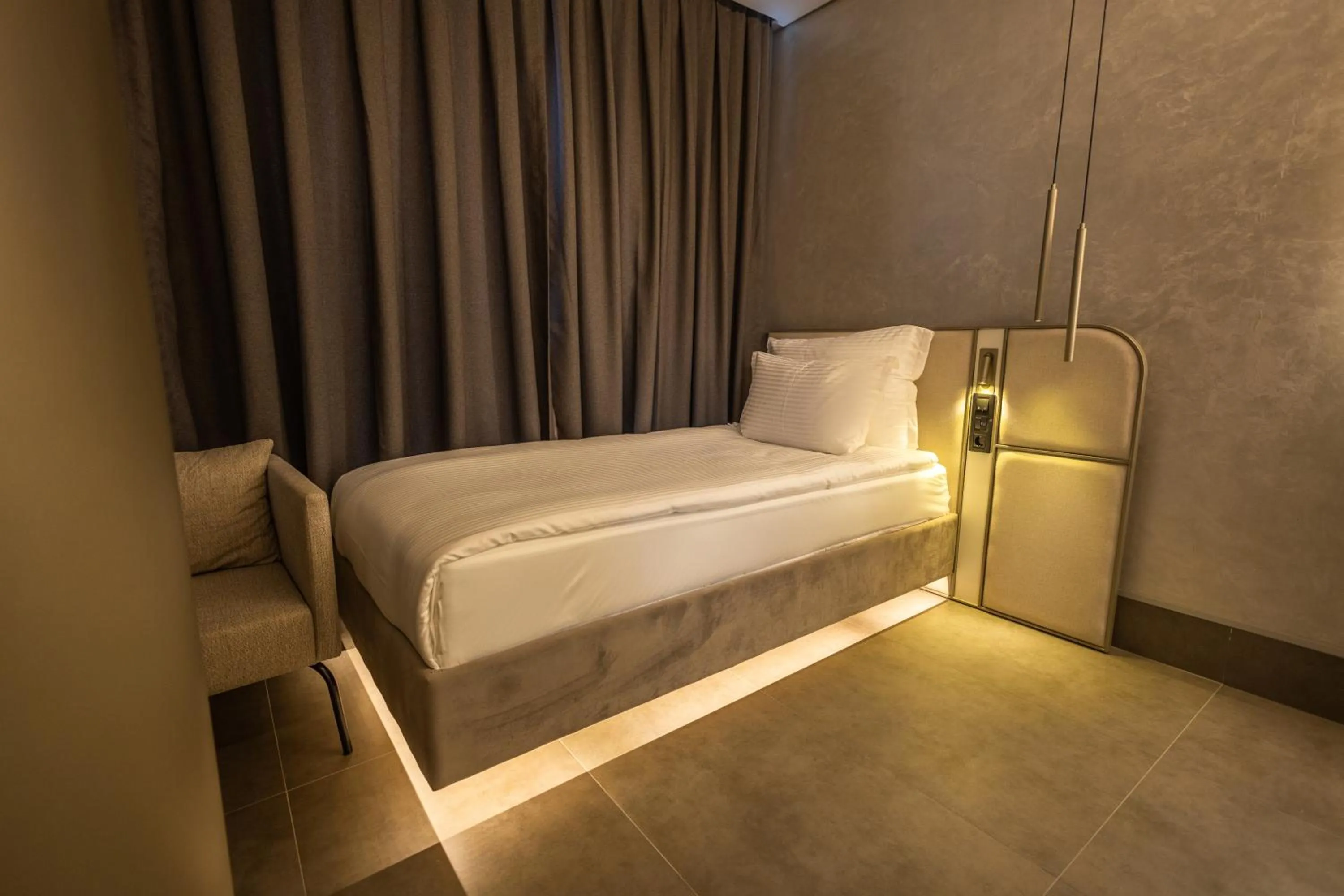 Bed in Four Hills Hotel