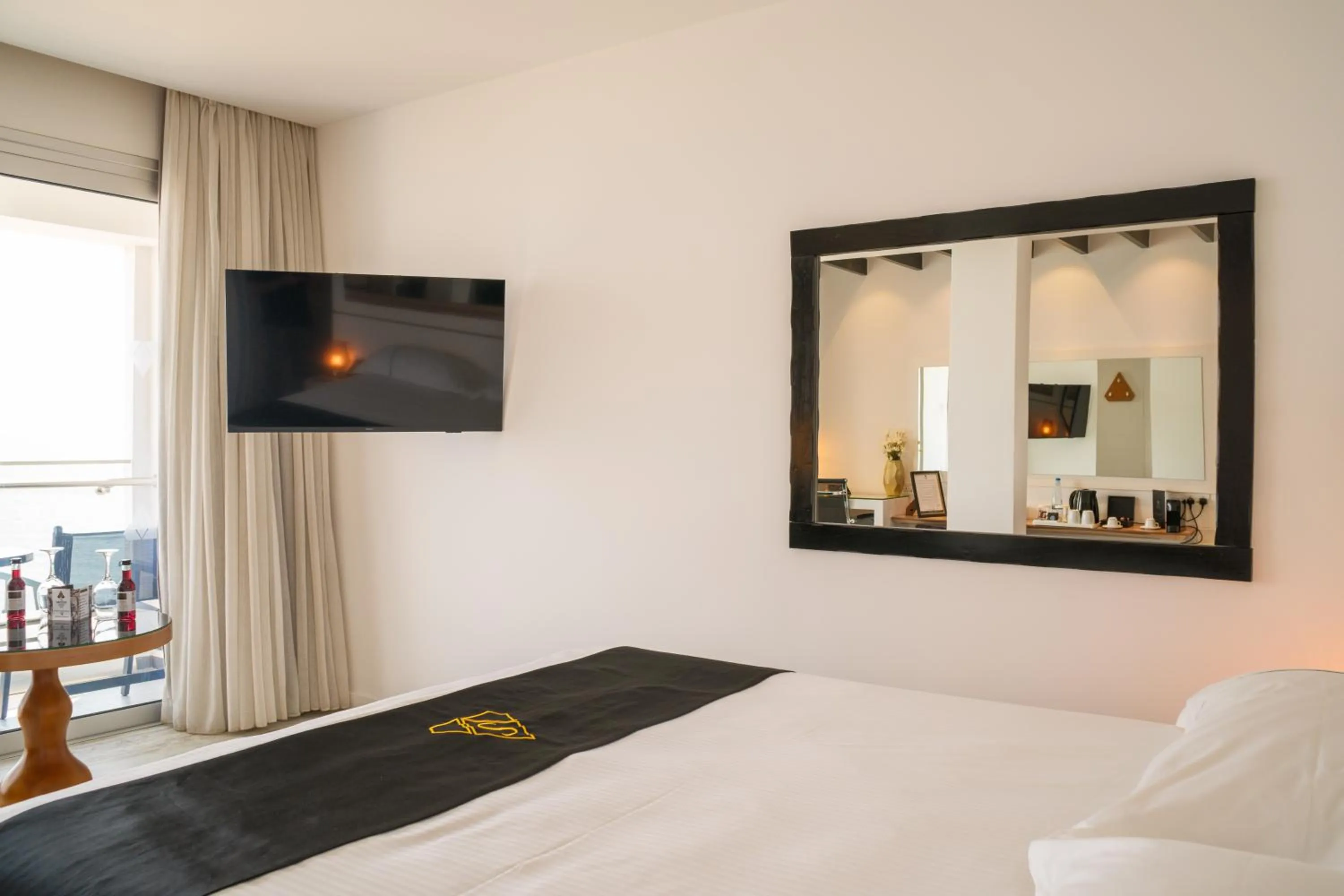 Bed in The Ciao Stelio Deluxe Boutique Hotel - Adults Only