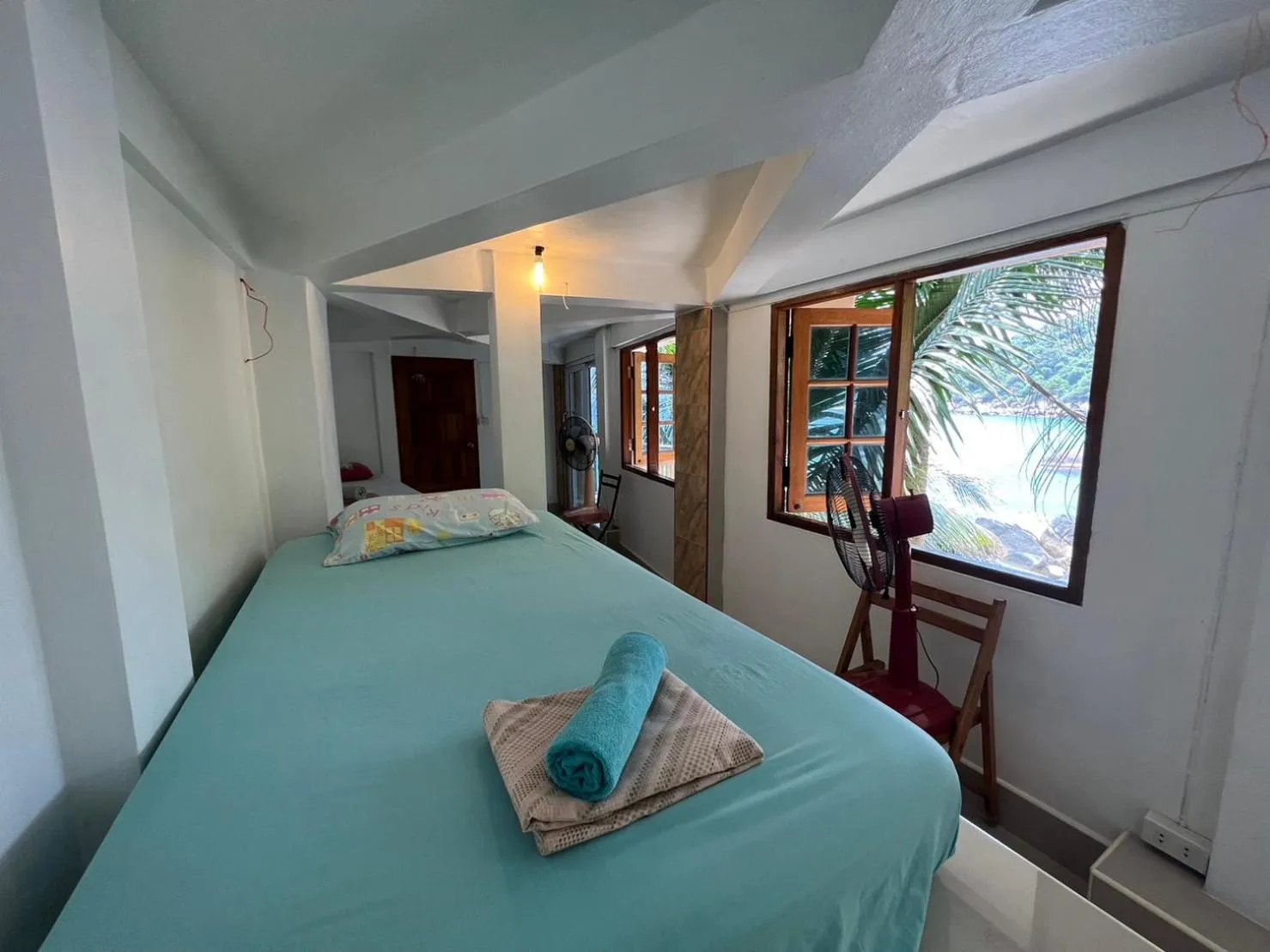 Bed in Hin Wong Apartments Dive & Snorkel Resort