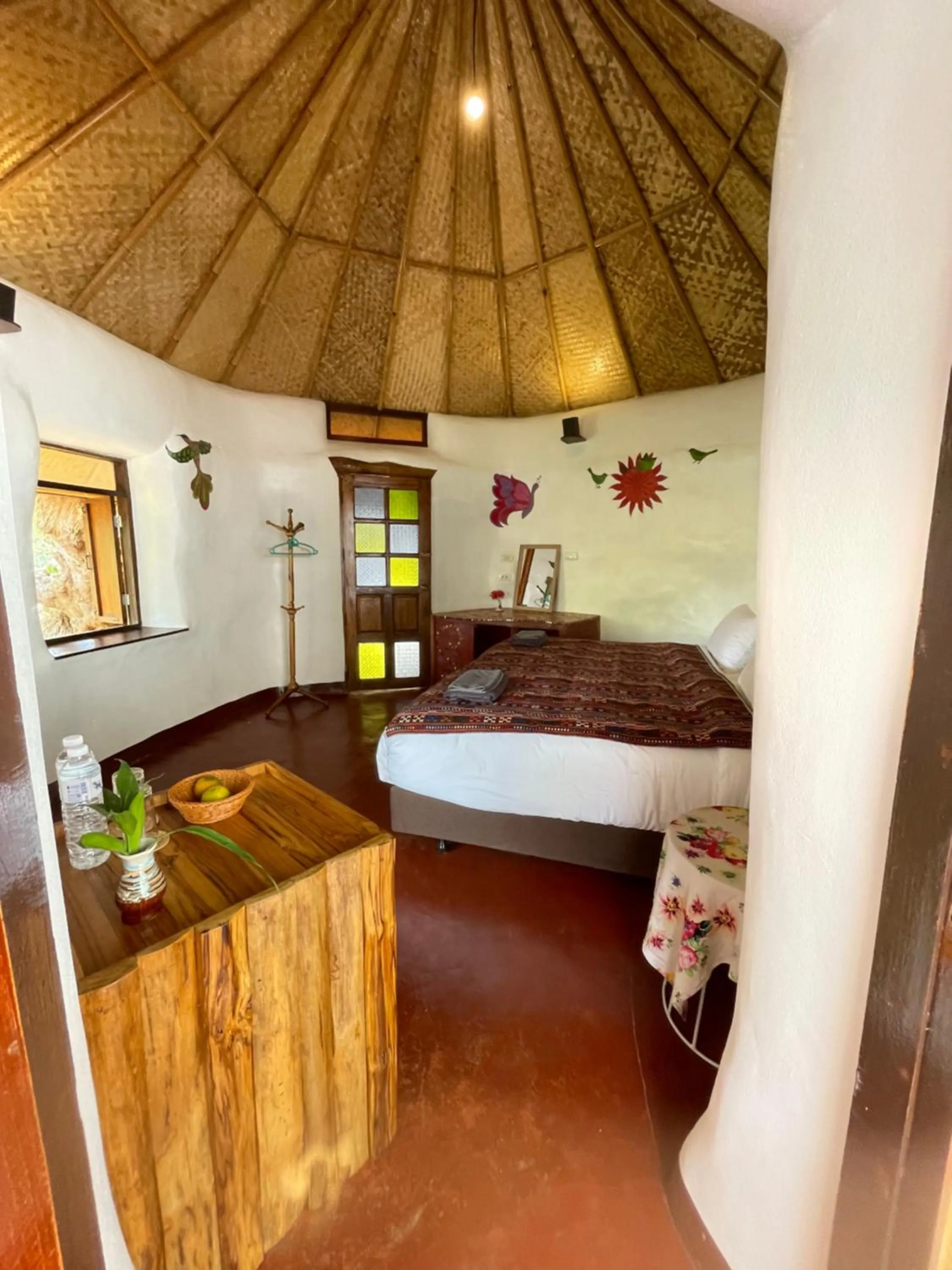 Photo of the whole room, Bed in Chiang Dao Roundhouses