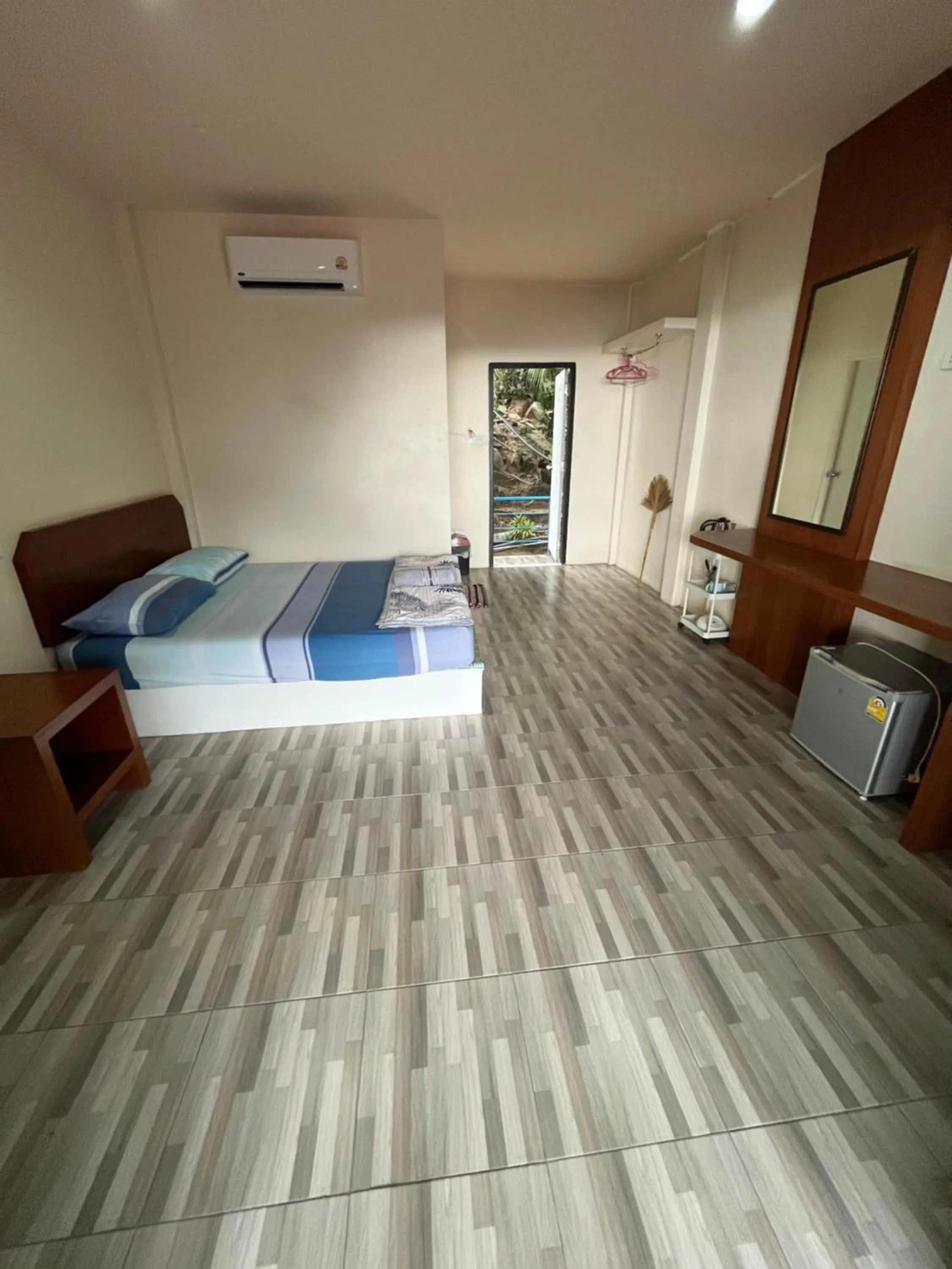 Photo of the whole room, Bed in J.B.Hut Bungalows