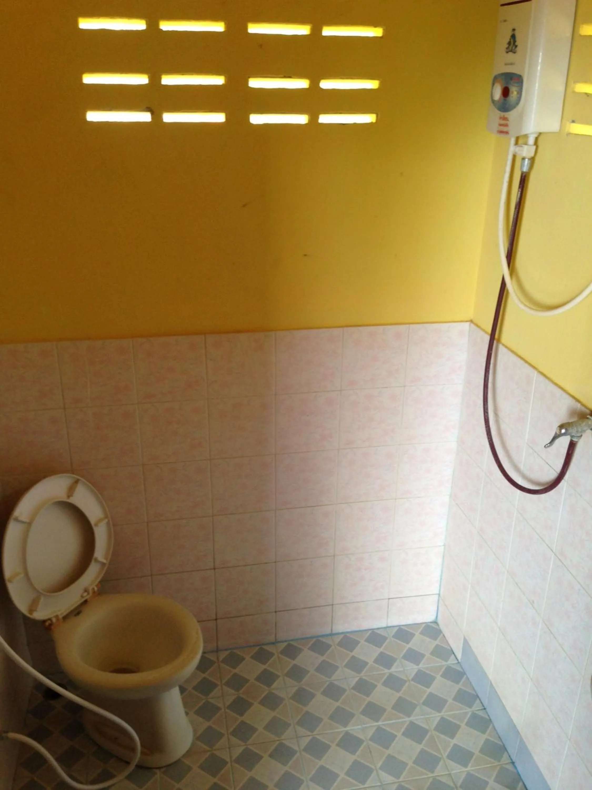 Toilet in J.B.Hut Bungalows