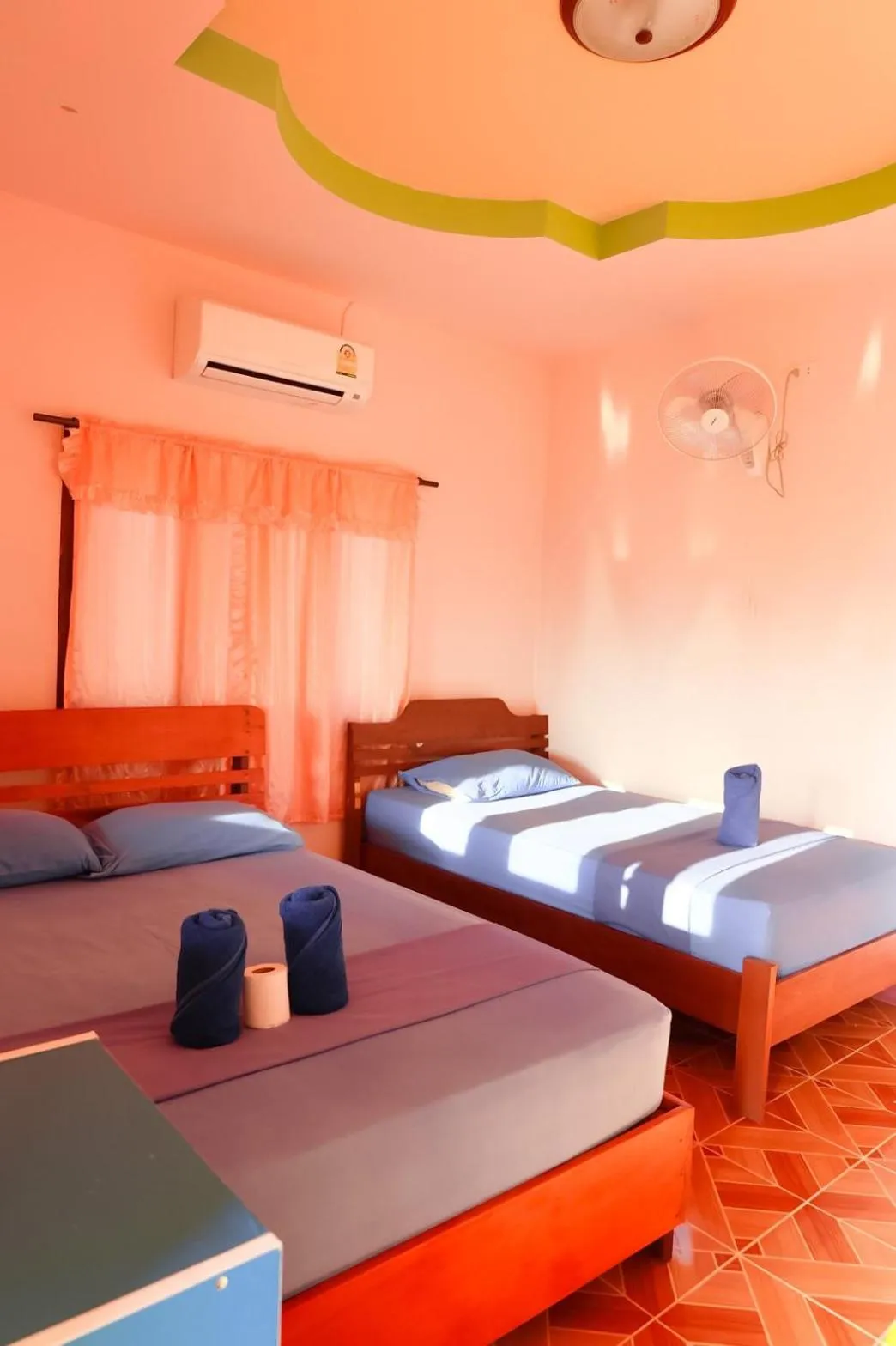 Bed in J.B.Hut Bungalows