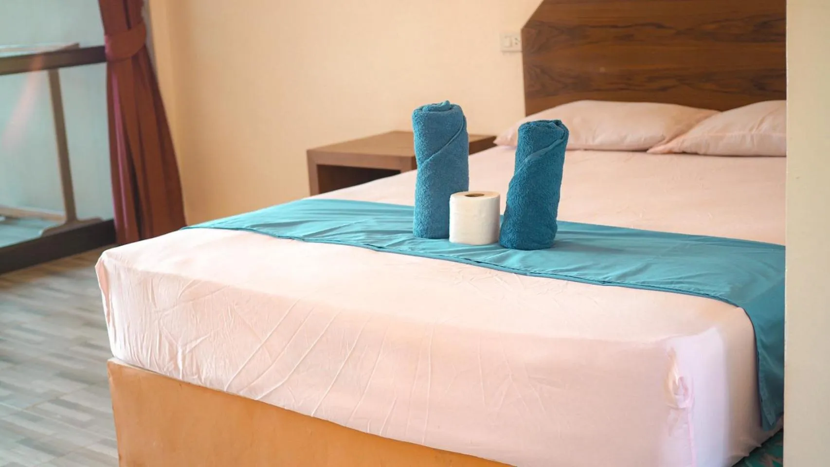 Bed in J.B.Hut Bungalows