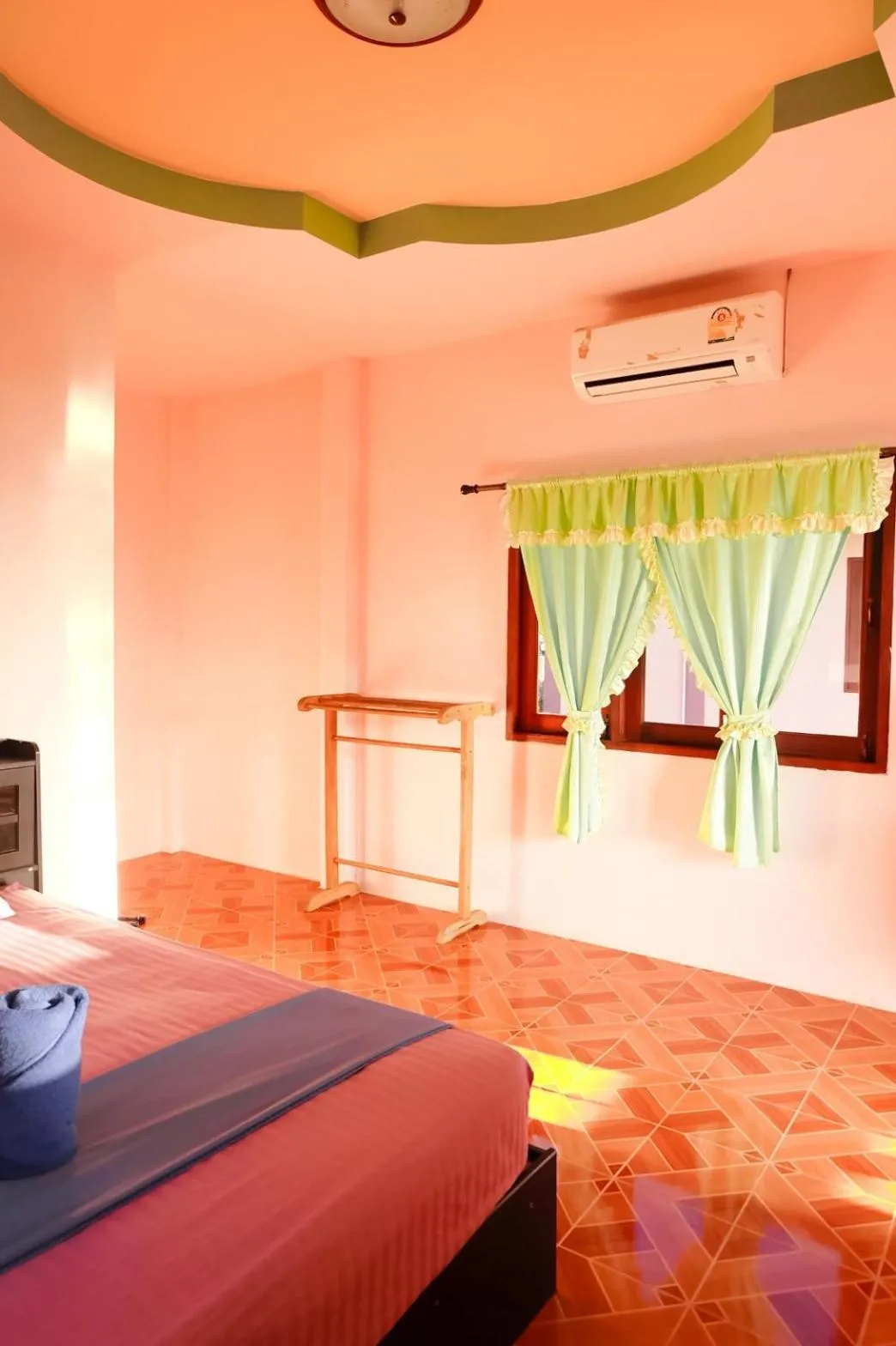 Bed in J.B.Hut Bungalows