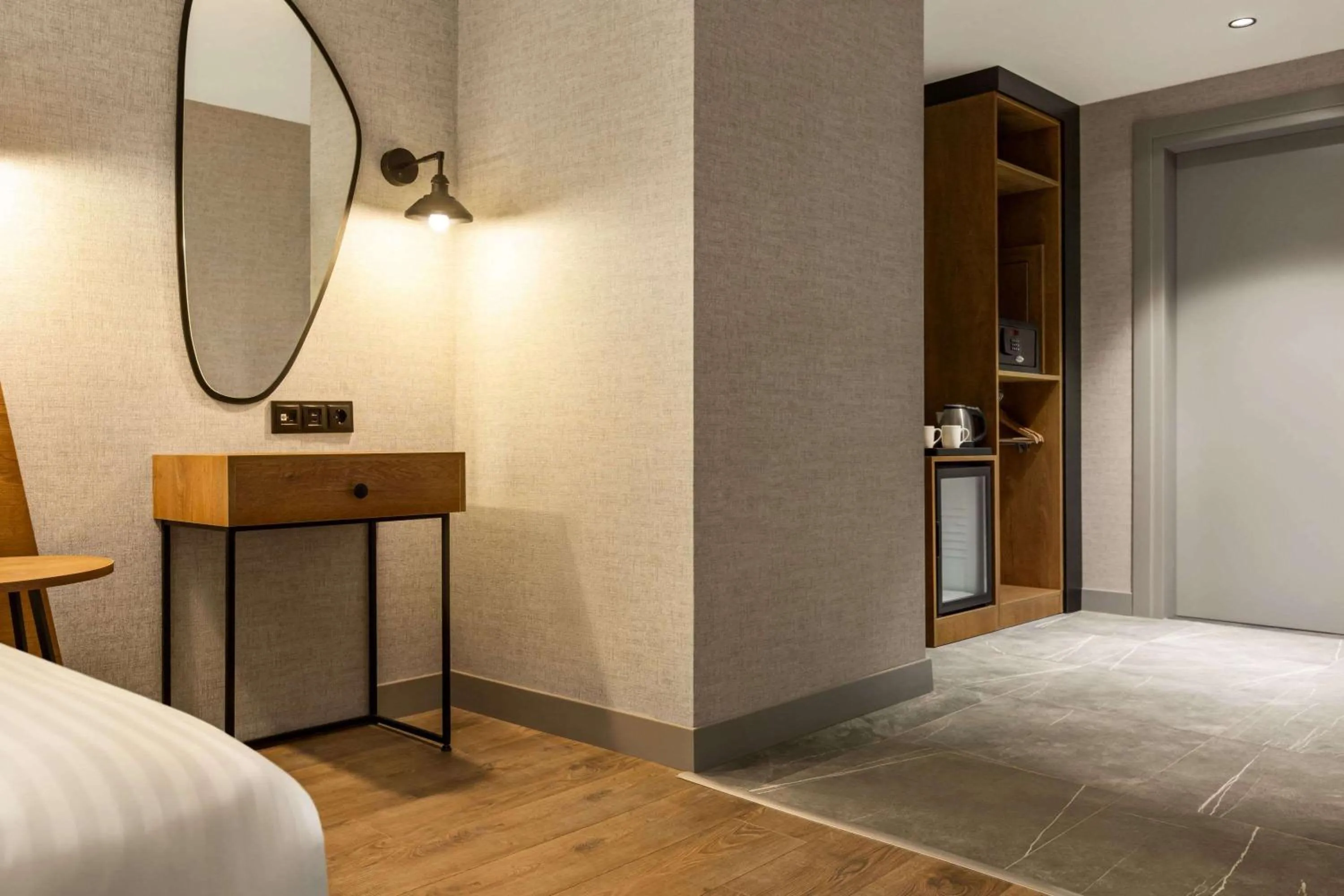 Photo of the whole room, Bed in Ramada Encore by Wyndham Istanbul Arnavutkoy