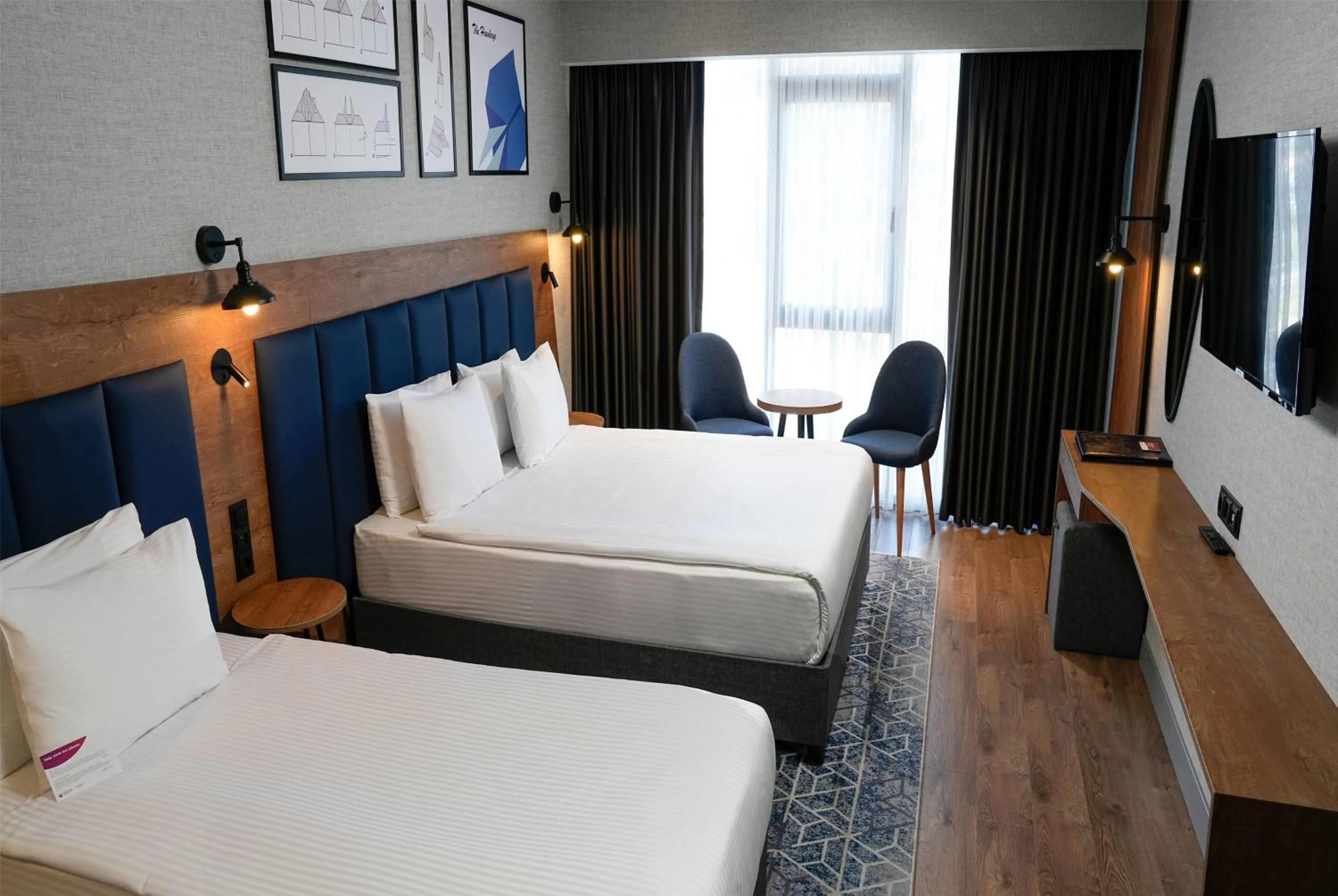 Photo of the whole room, Bed in Ramada Encore by Wyndham Istanbul Arnavutkoy