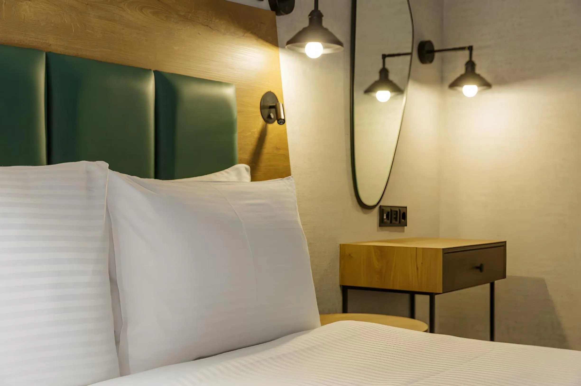 Bed in Ramada Encore by Wyndham Istanbul Arnavutkoy