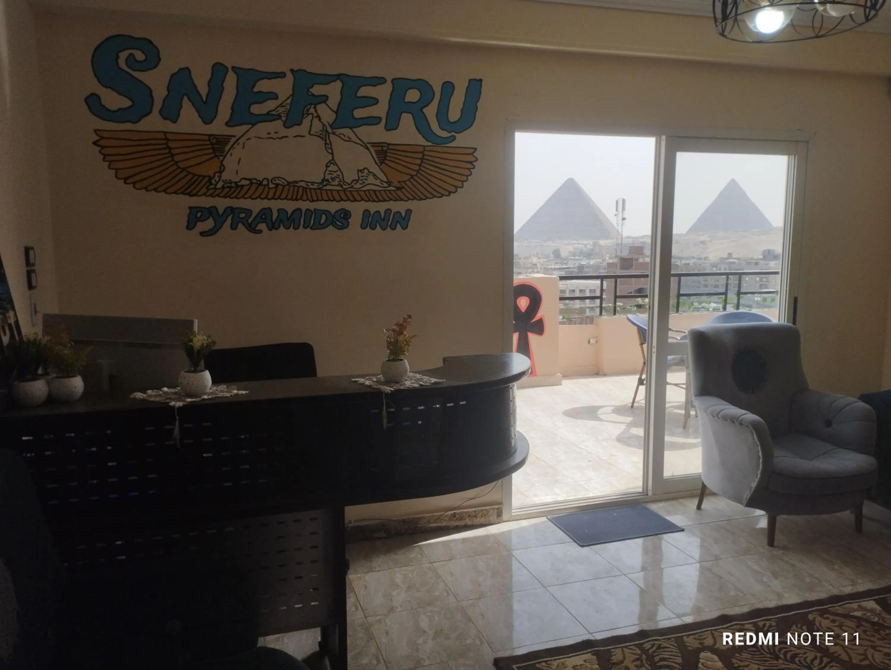 Property logo or sign in Sneferu Pyramids inn - Full Pyramids View