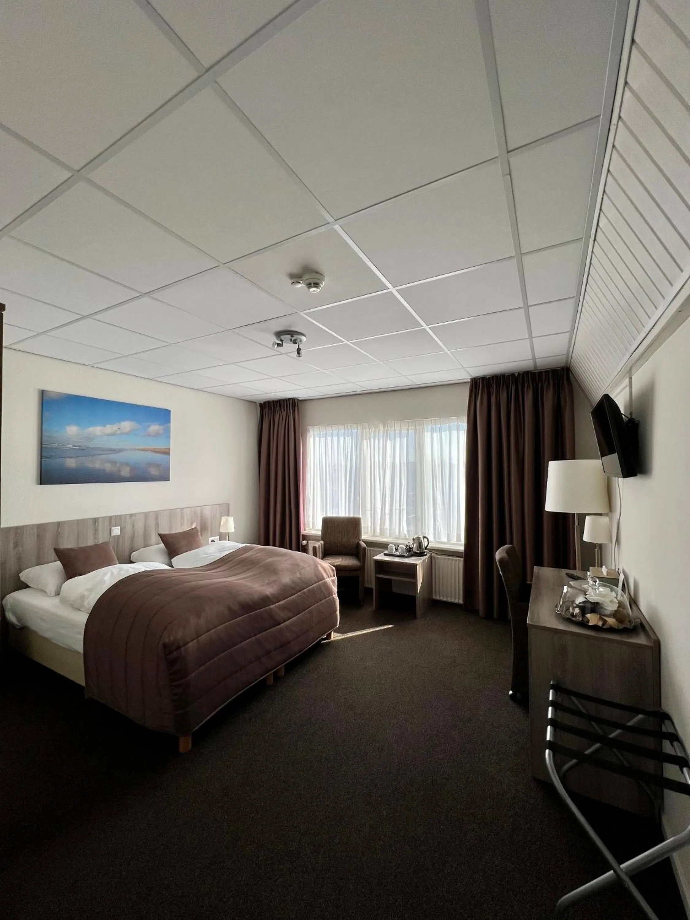 Photo of the whole room, Bed in SEA YOU Hotel Noordwijk