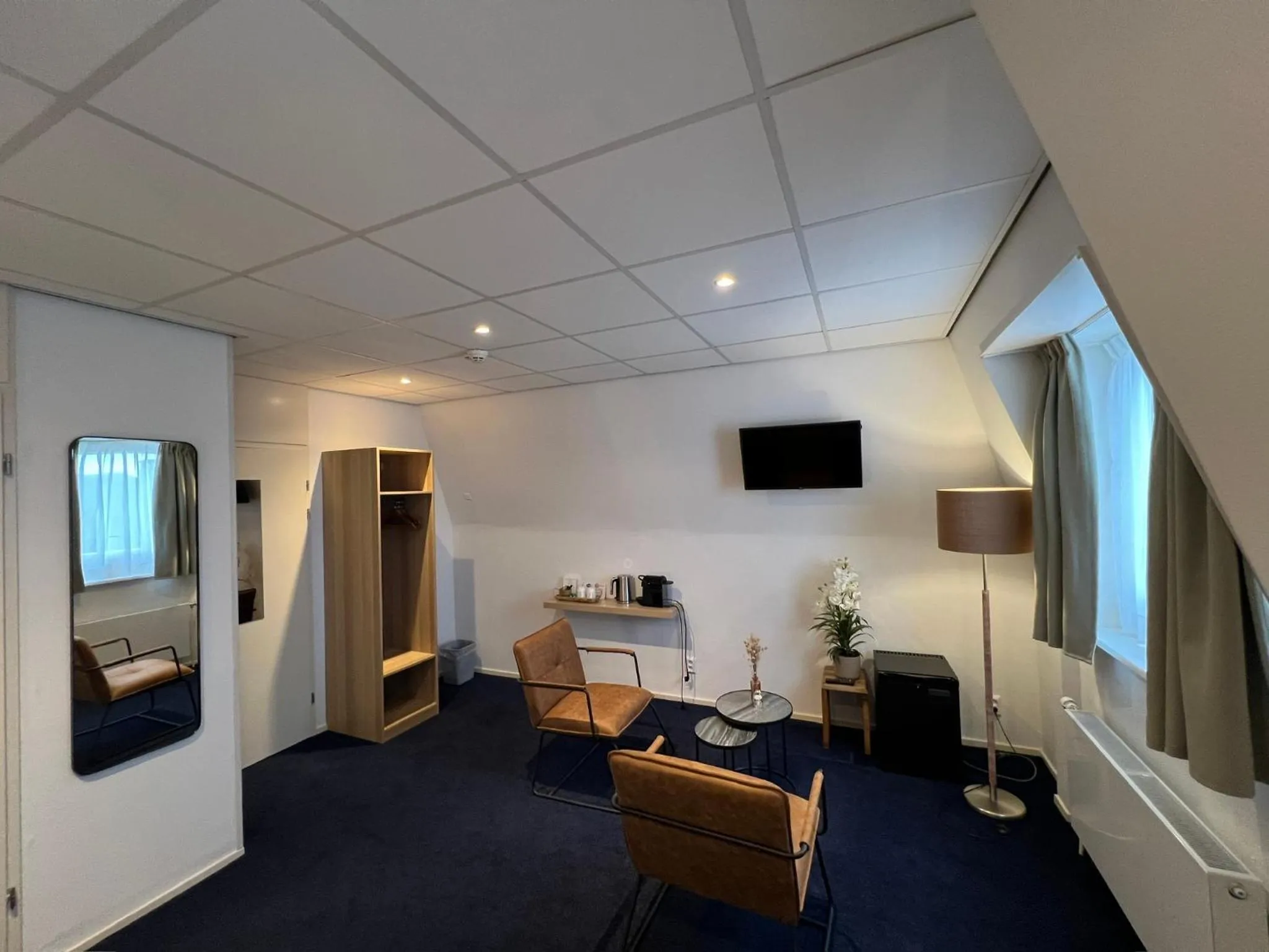 Seating area, Bed in SEA YOU Hotel Noordwijk