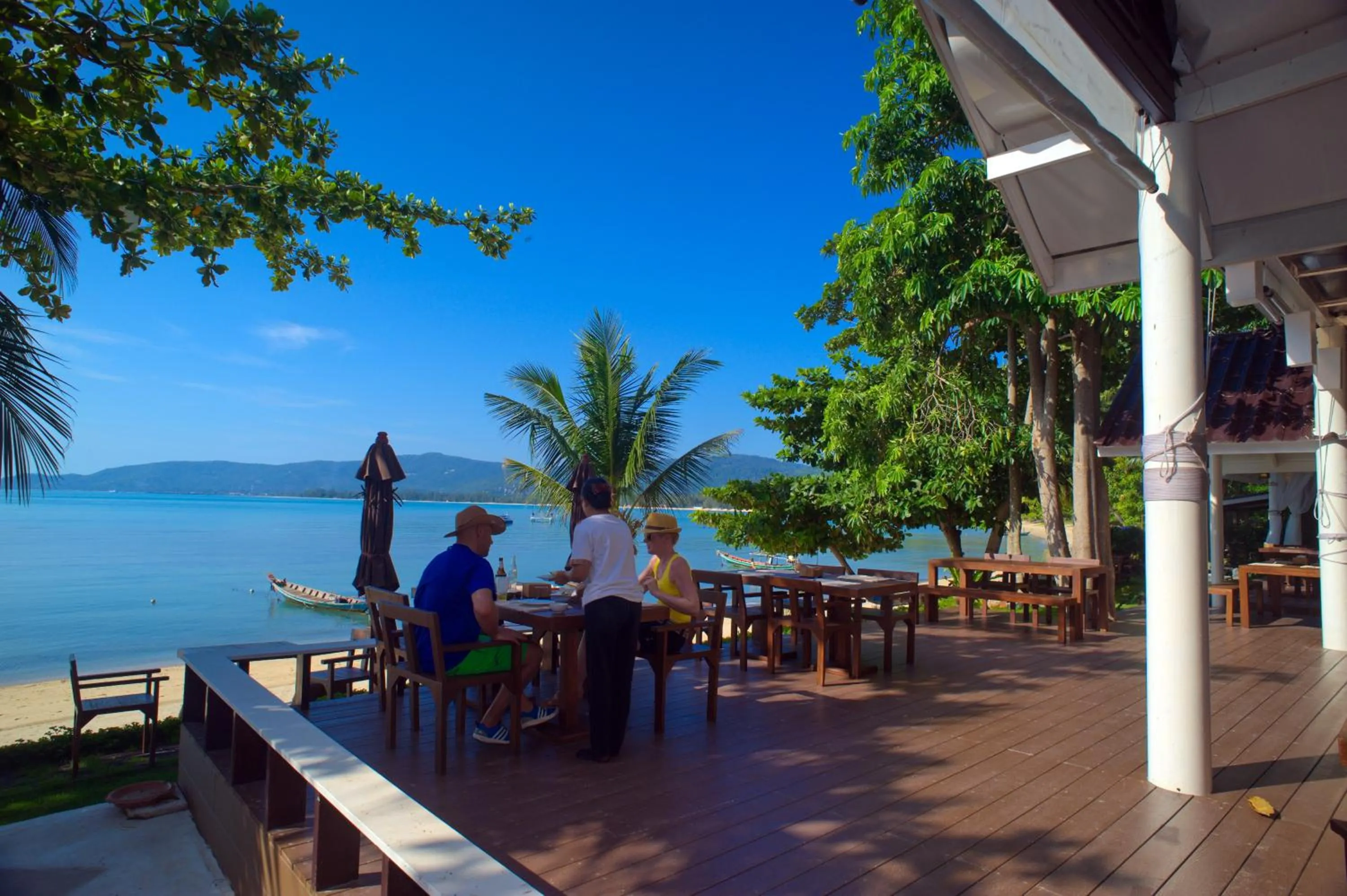 Communal lounge/ TV room in At Samui Haus