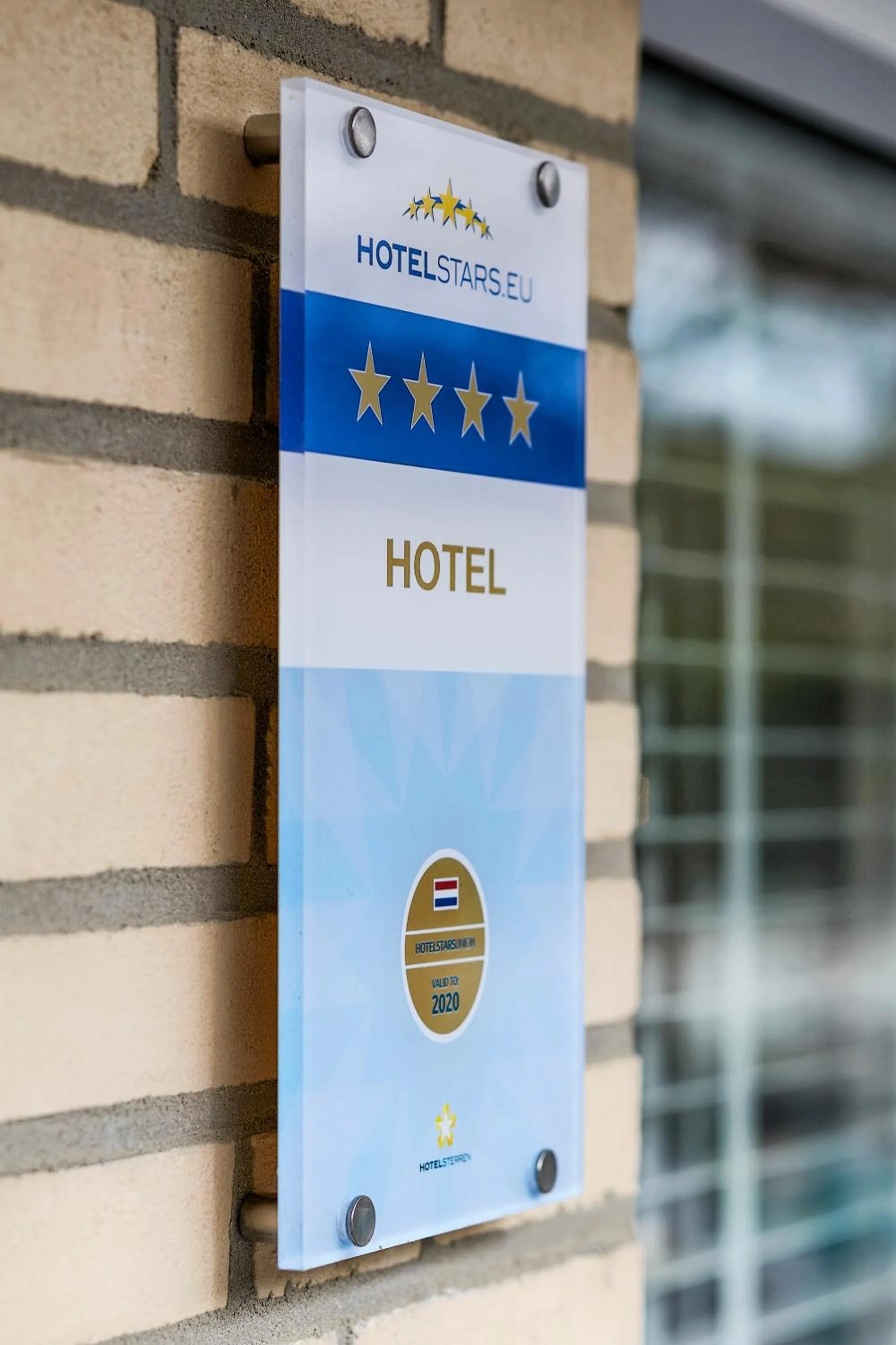 Property logo or sign in Beach Hotel I Kloeg Collection