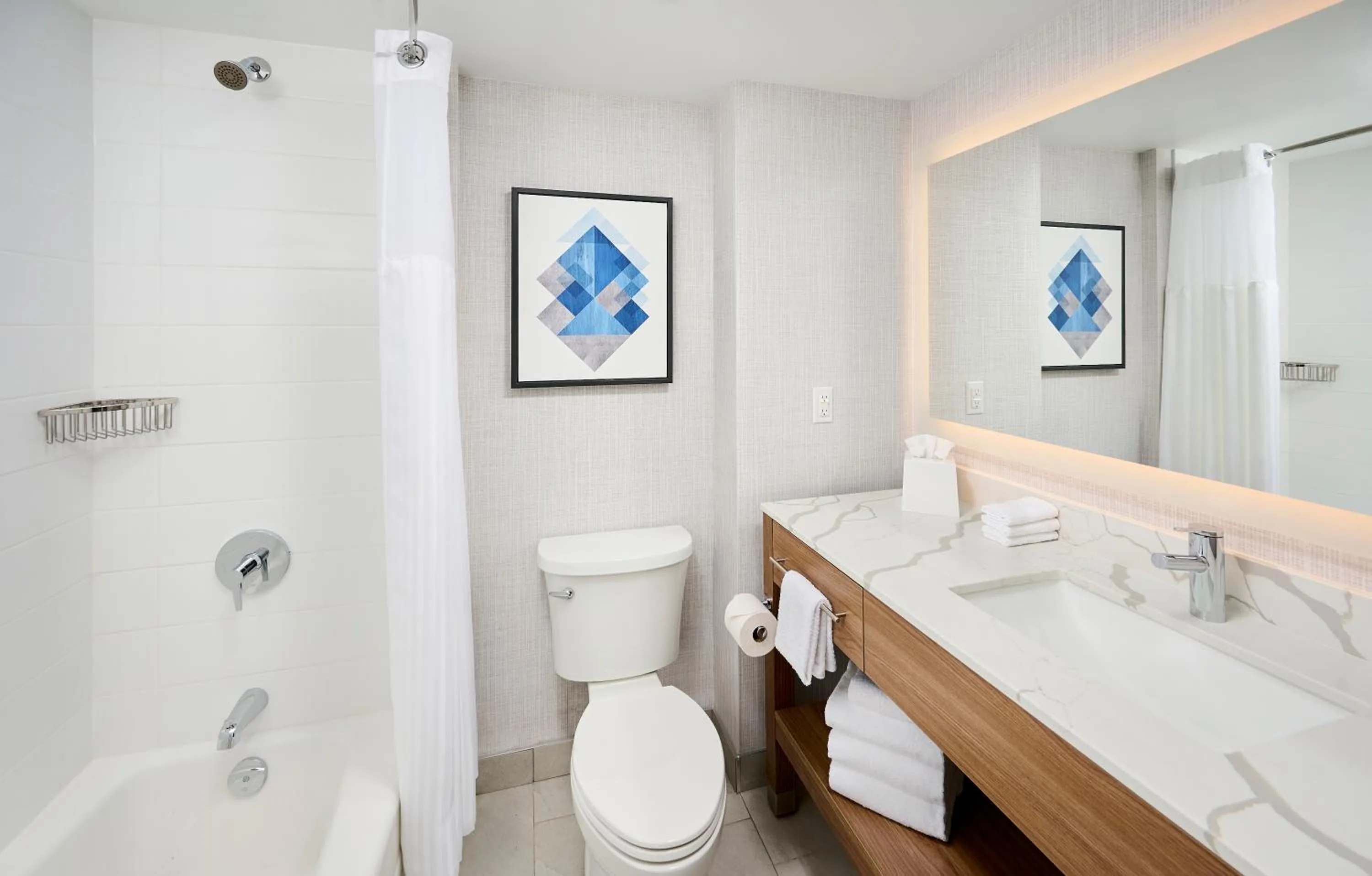 Bathroom in Candlewood Suites Burlington Conference Centre by IHG