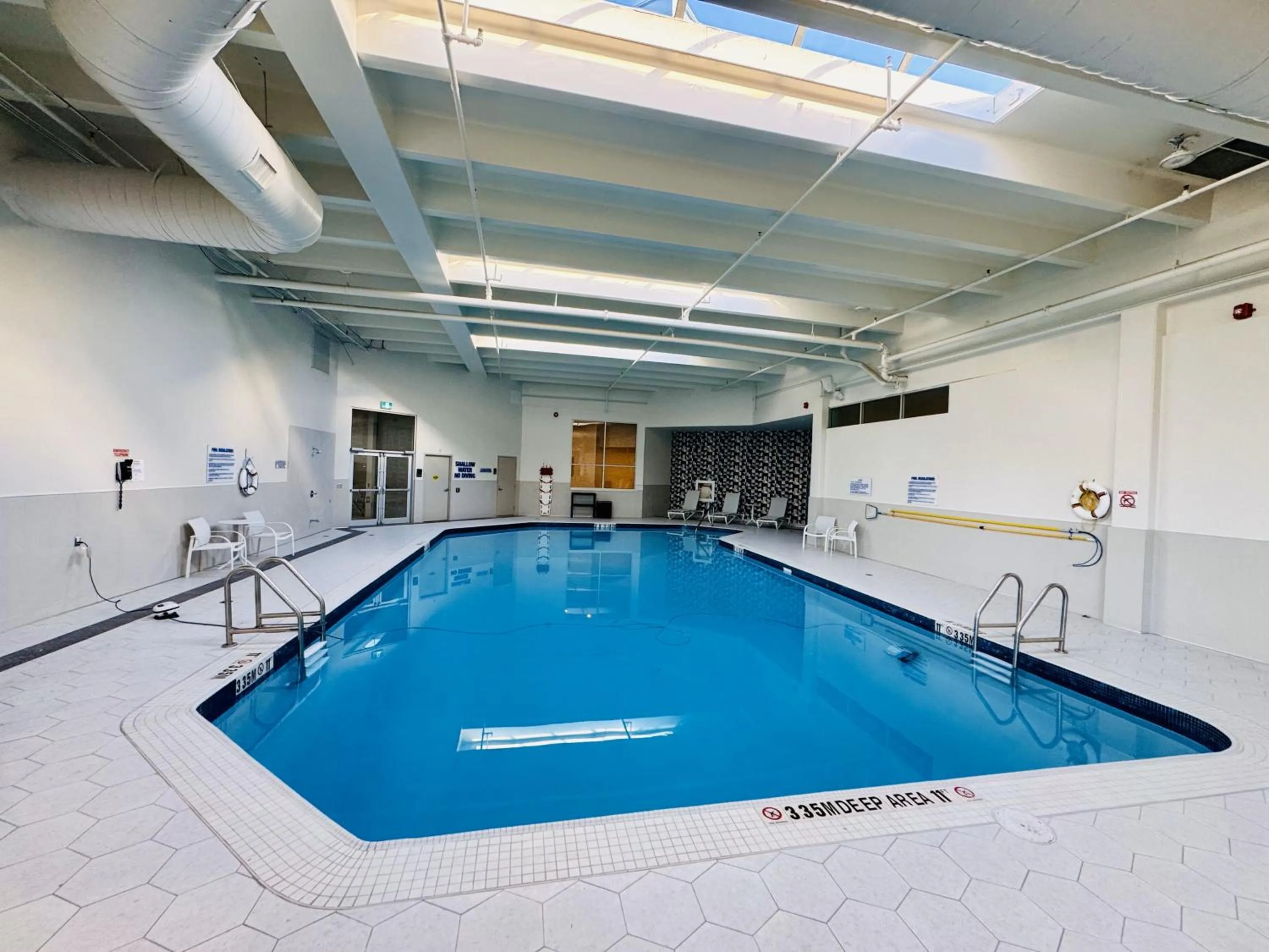 Swimming pool in Candlewood Suites Burlington Conference Centre by IHG