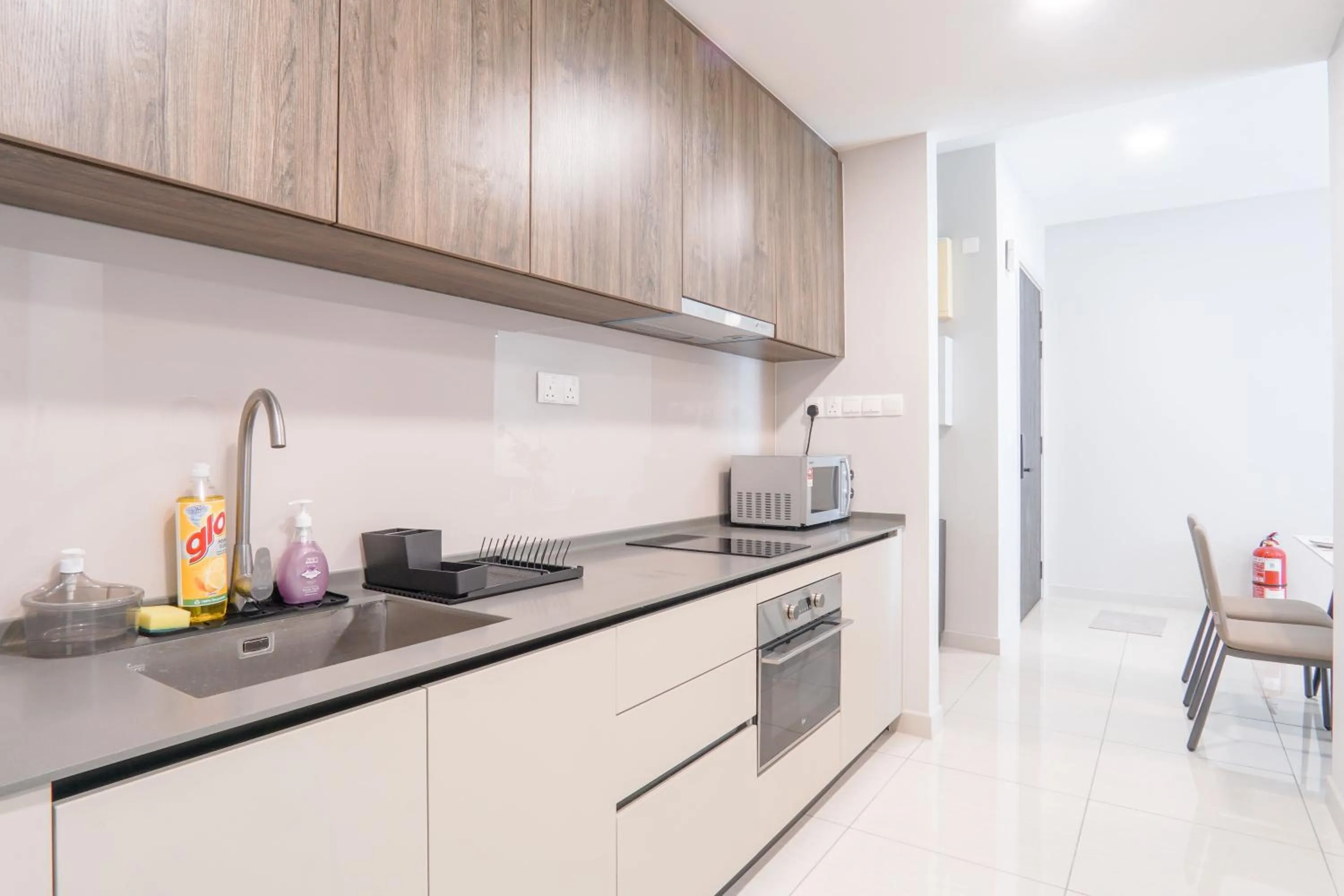 kitchen in Datum Jelatek Residence by Airhost