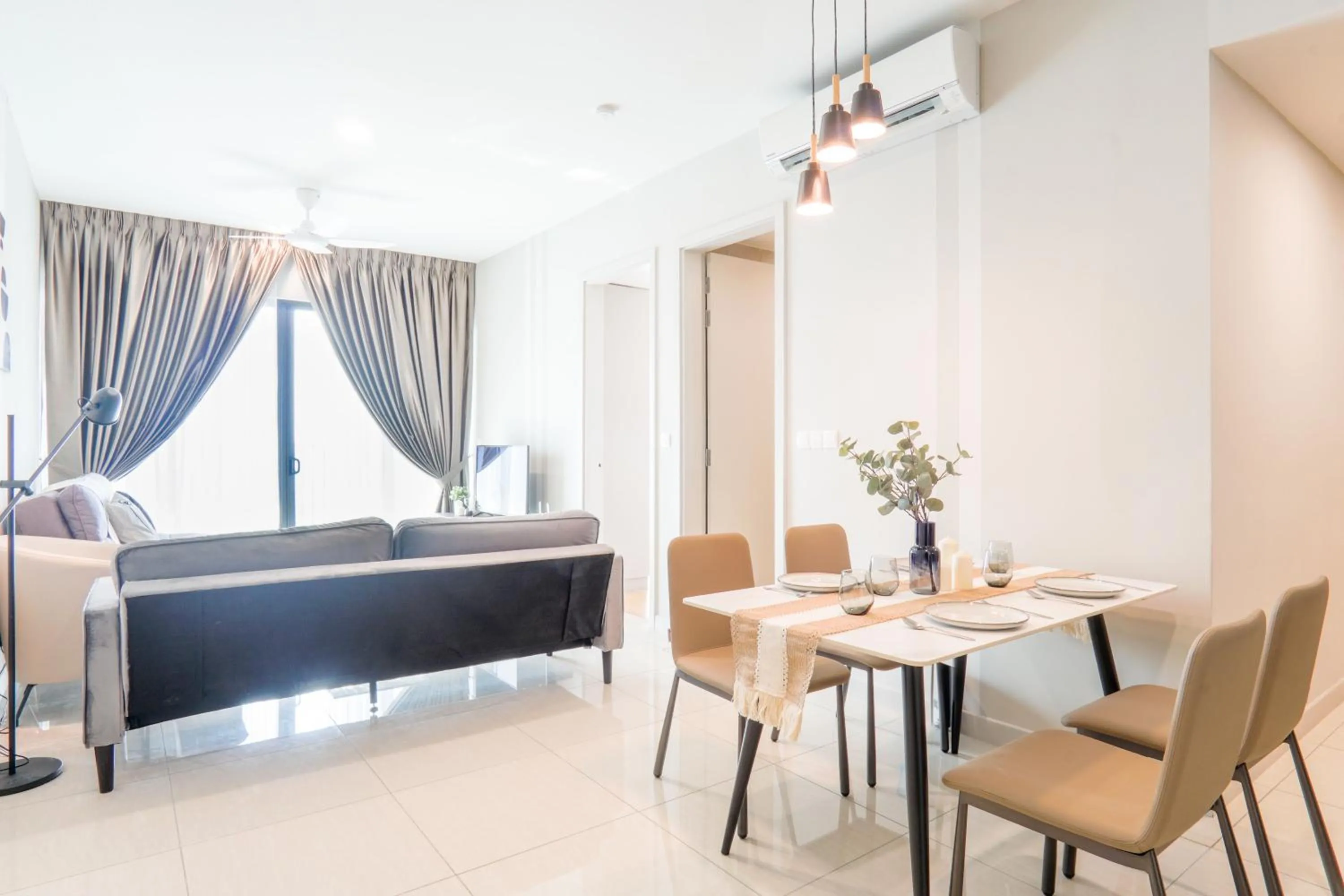 Living room in Datum Jelatek Residence by Airhost