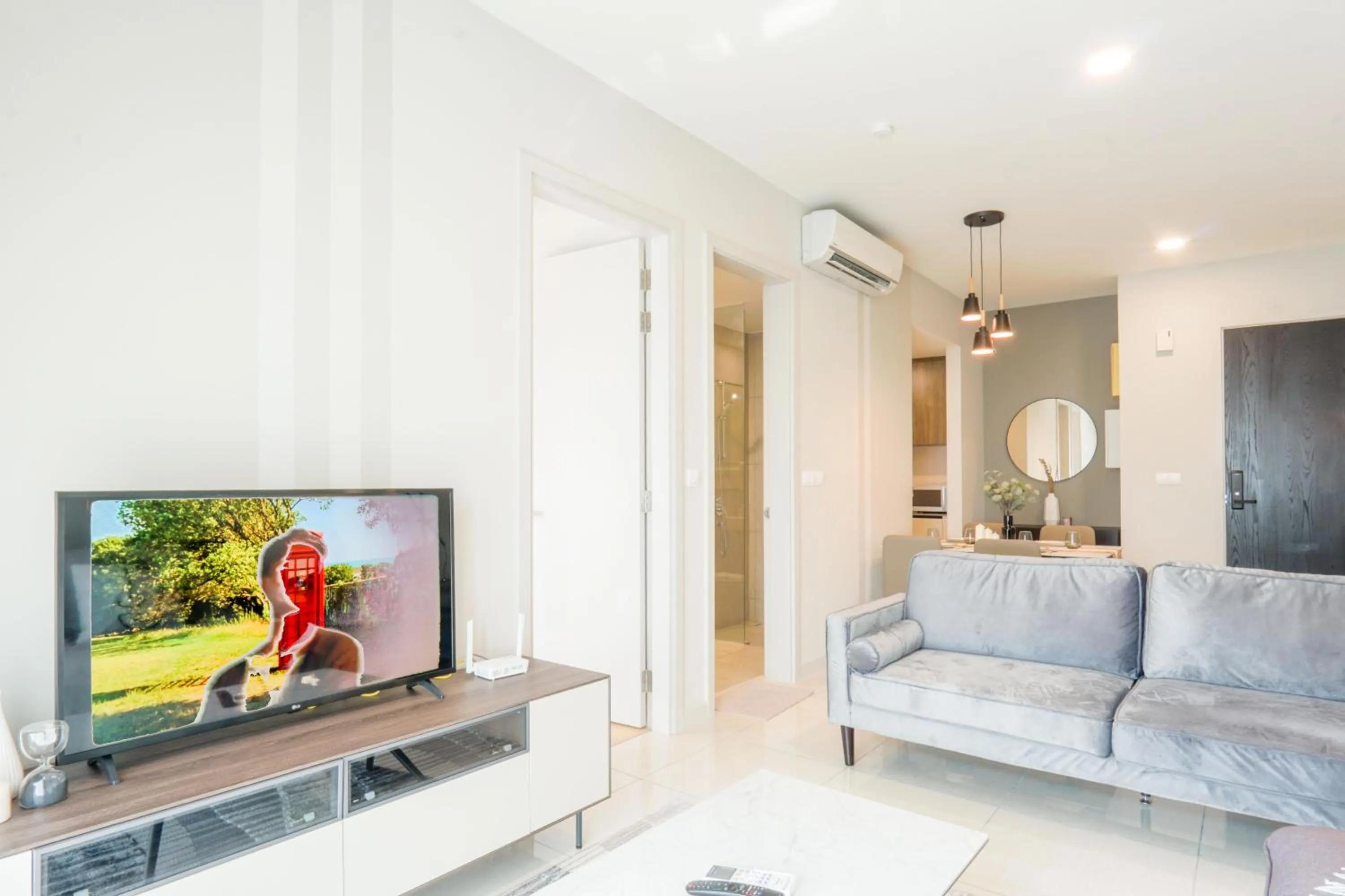 Living room in Datum Jelatek Residence by Airhost