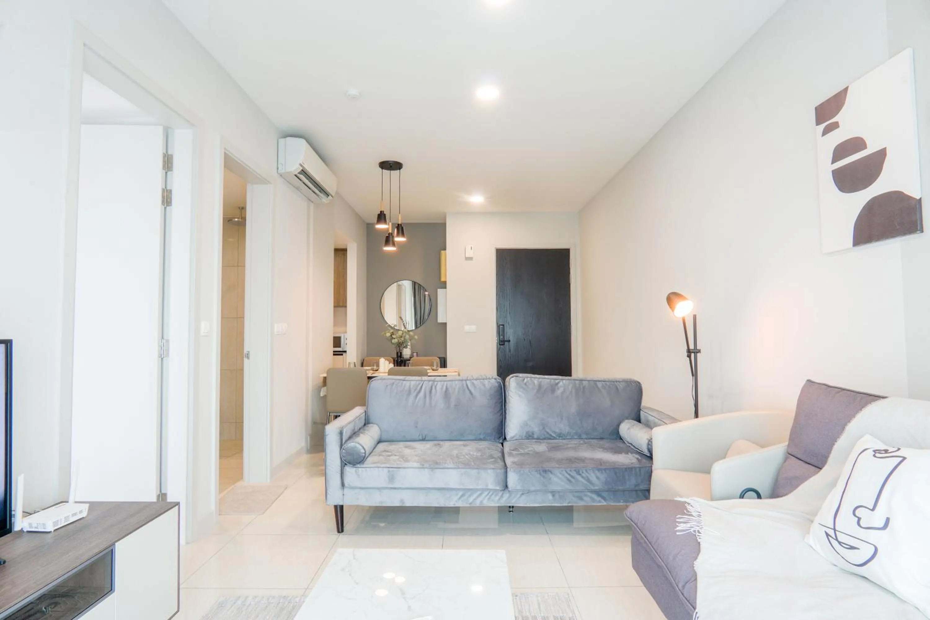 Living room in Datum Jelatek Residence by Airhost