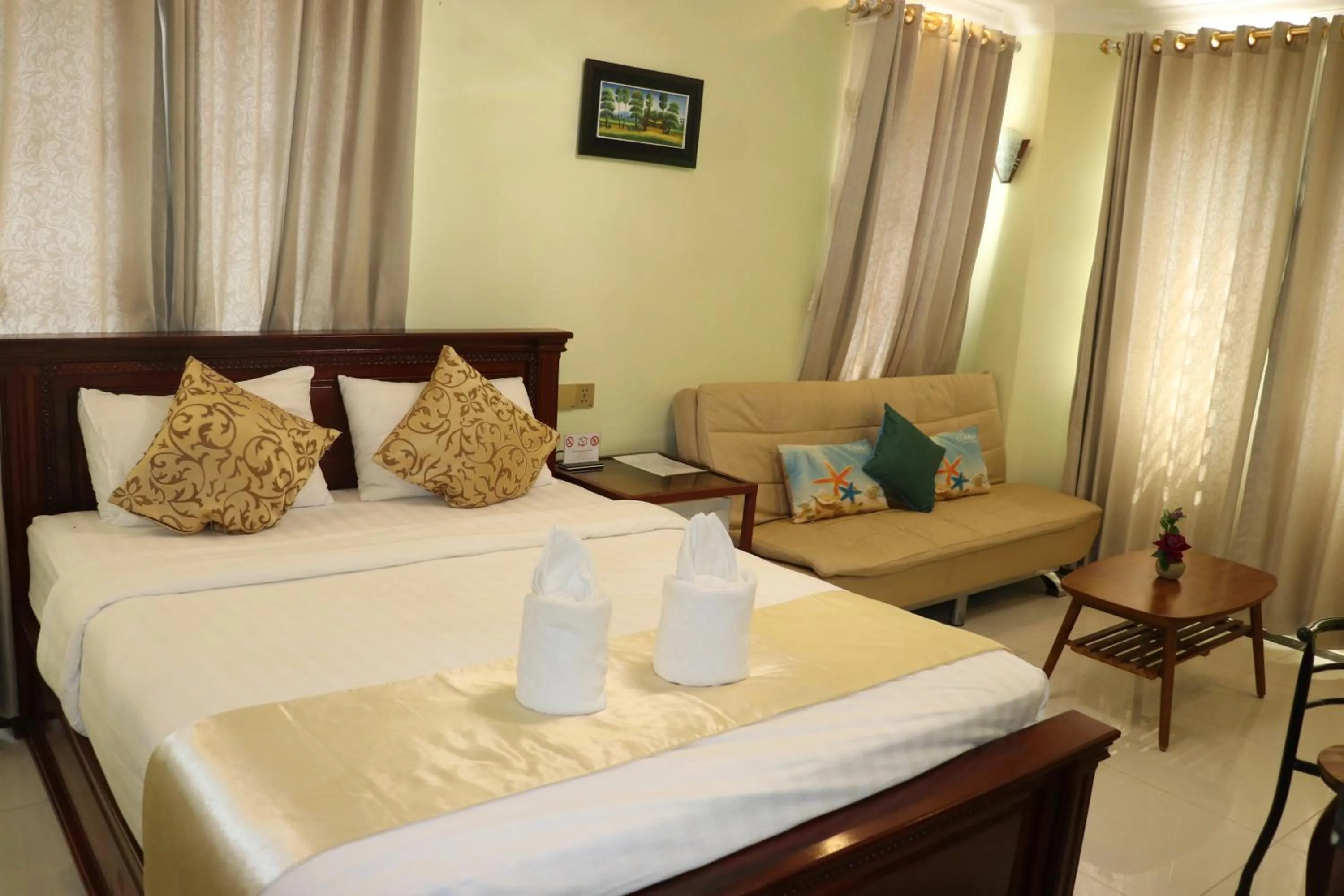 Bed in AHHA Boutique Kampot