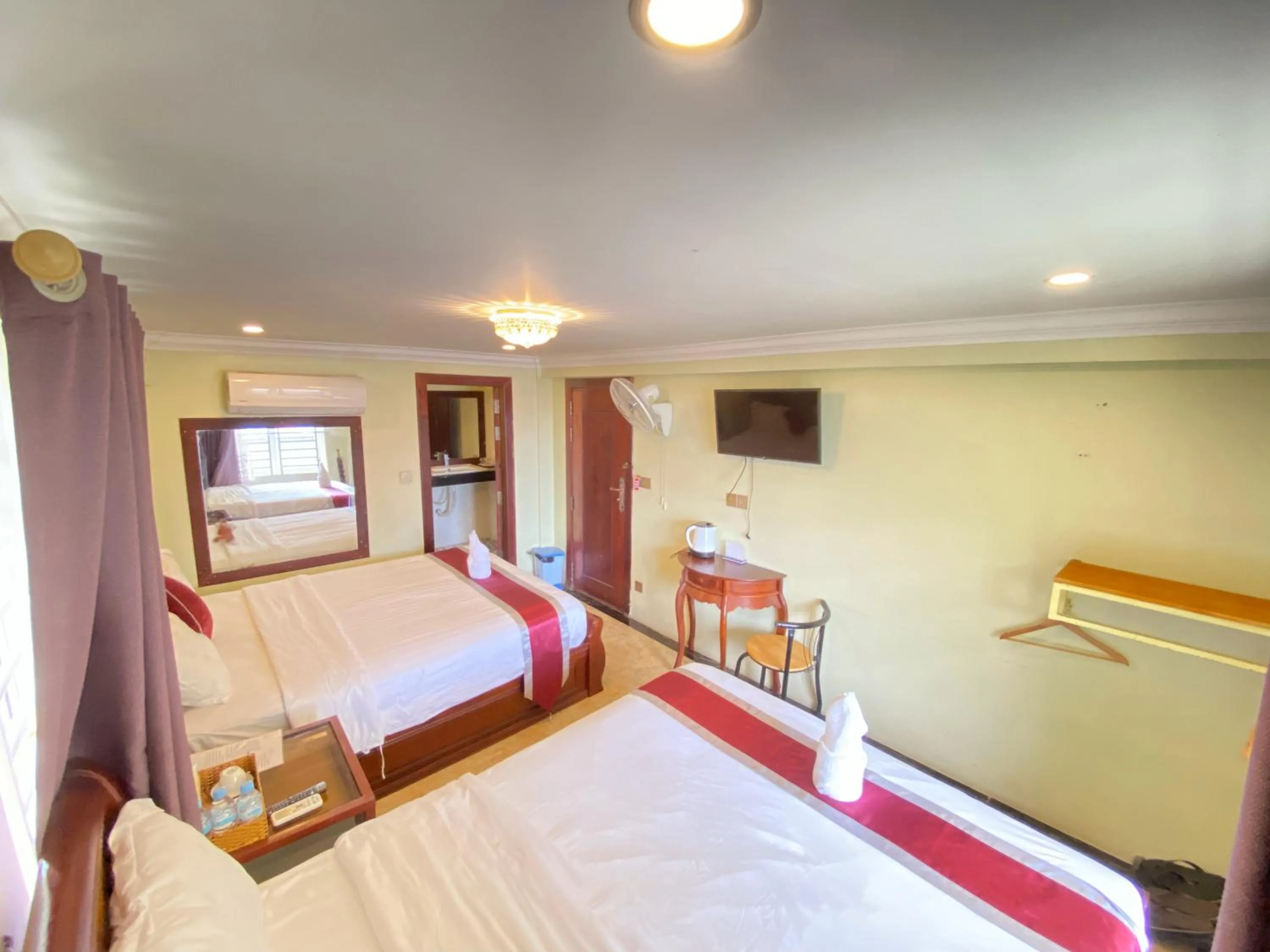 Bed in AHHA Boutique Kampot