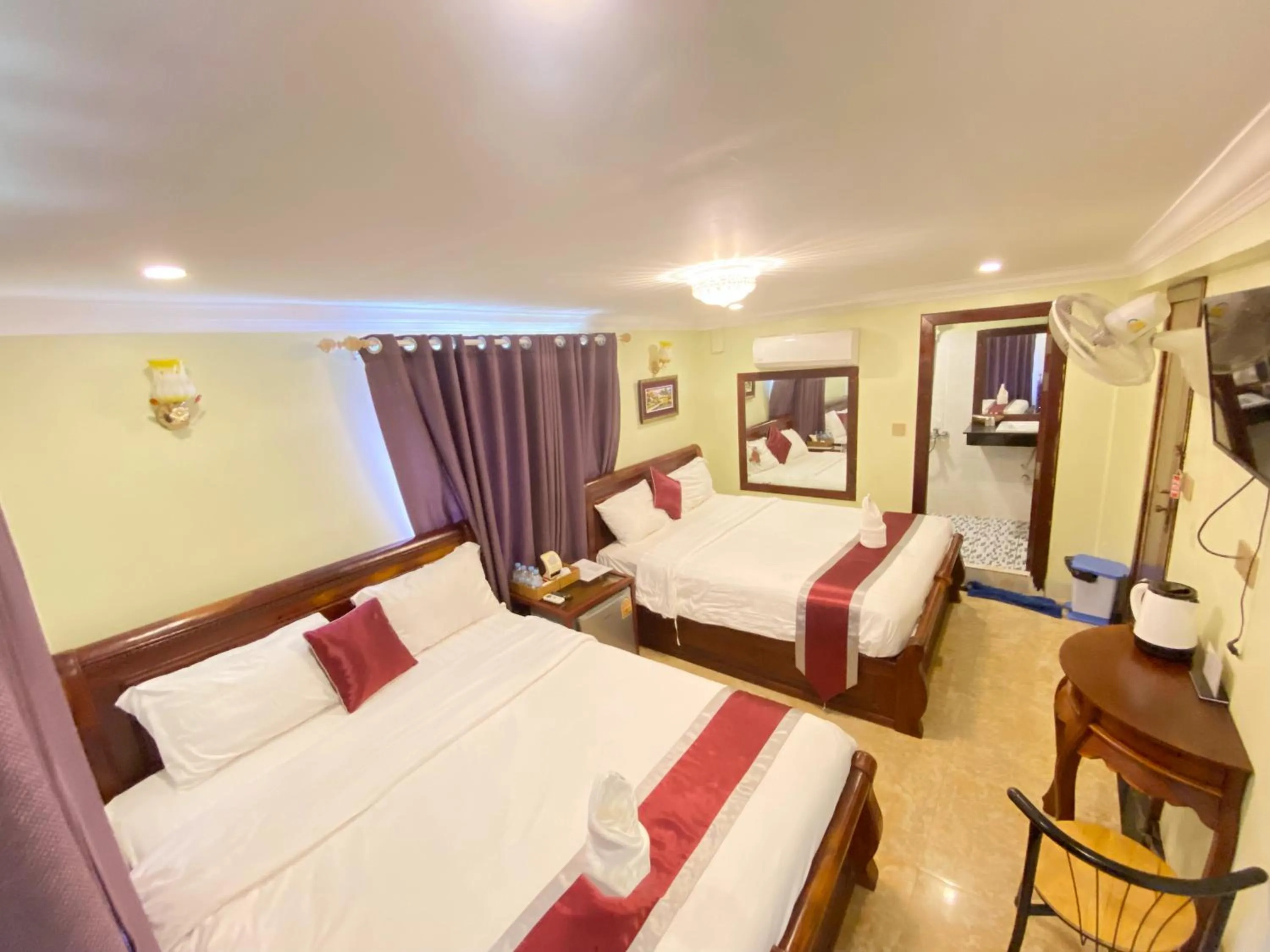 Bed in AHHA Boutique Kampot