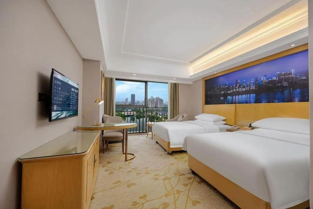 Bed in Vienna Hotel Chongqing Yongchuan High-Speed Railway Station Xinglong Lake