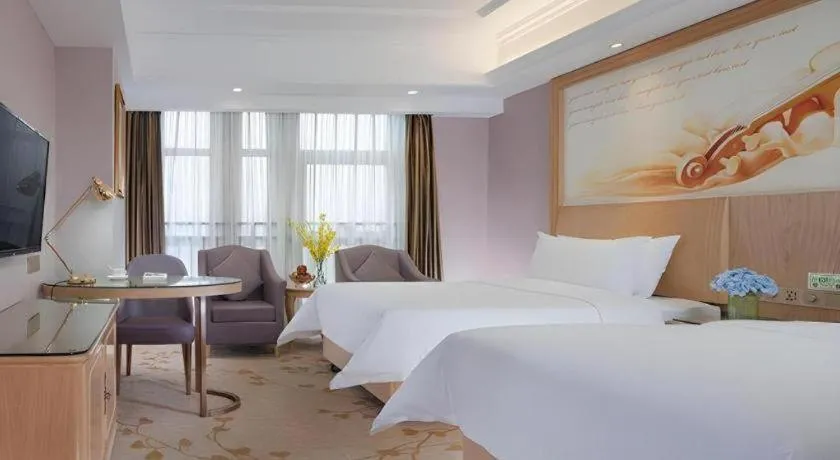 Bed in Vienna Hotel Chongqing Yongchuan High-Speed Railway Station Xinglong Lake