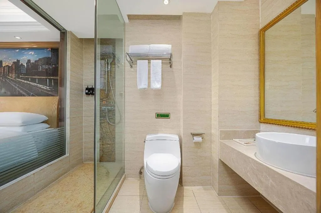 Bed in Vienna Hotel Chongqing Yongchuan High-Speed Railway Station Xinglong Lake