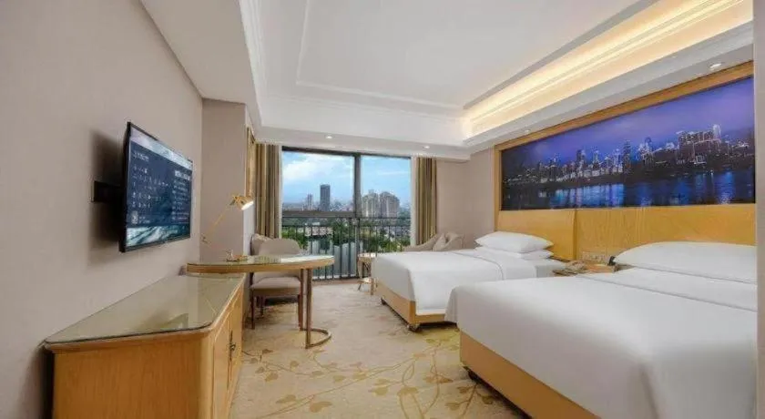 Bed in Vienna Hotel Chongqing Yongchuan High-Speed Railway Station Xinglong Lake
