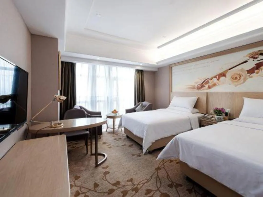 Bed in Vienna Hotel Chongqing Yongchuan High-Speed Railway Station Xinglong Lake