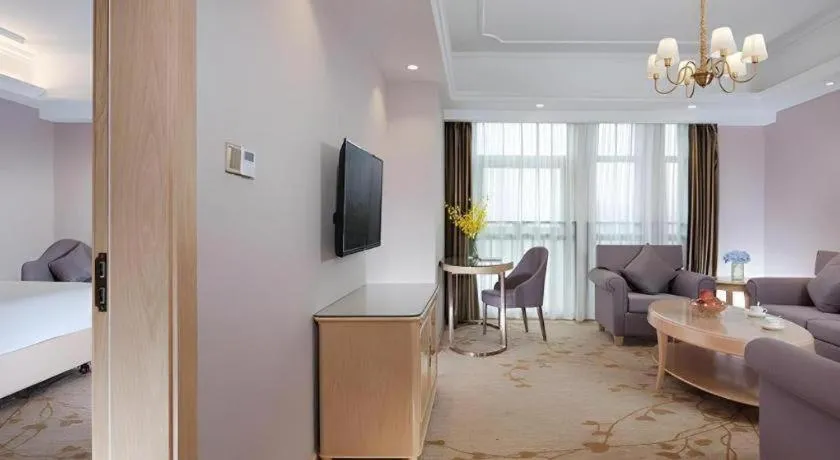 Bed in Vienna Hotel Chongqing Yongchuan High-Speed Railway Station Xinglong Lake