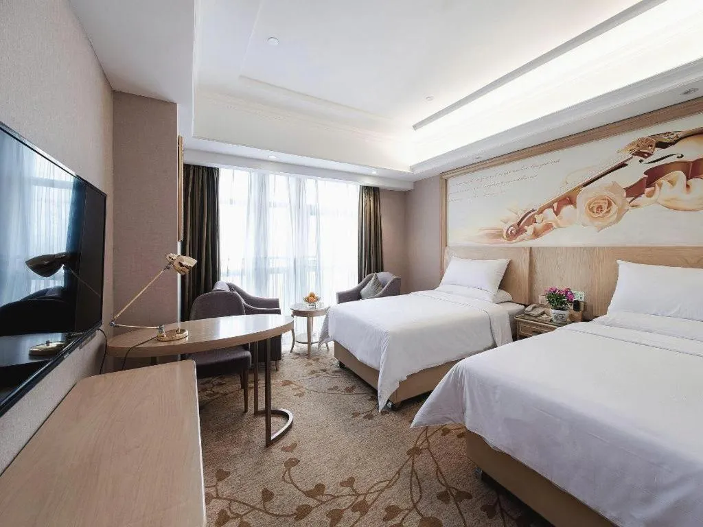 Bed in Vienna Hotel Chongqing Yongchuan High-Speed Railway Station Xinglong Lake