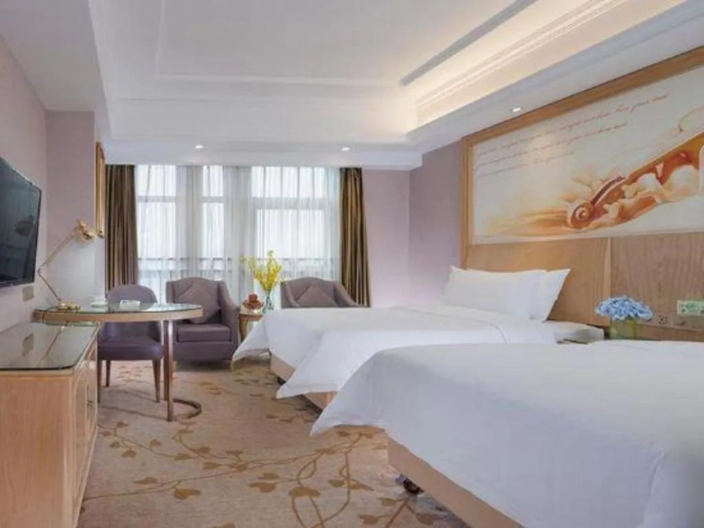 Bed in Vienna Hotel Chongqing Yongchuan High-Speed Railway Station Xinglong Lake